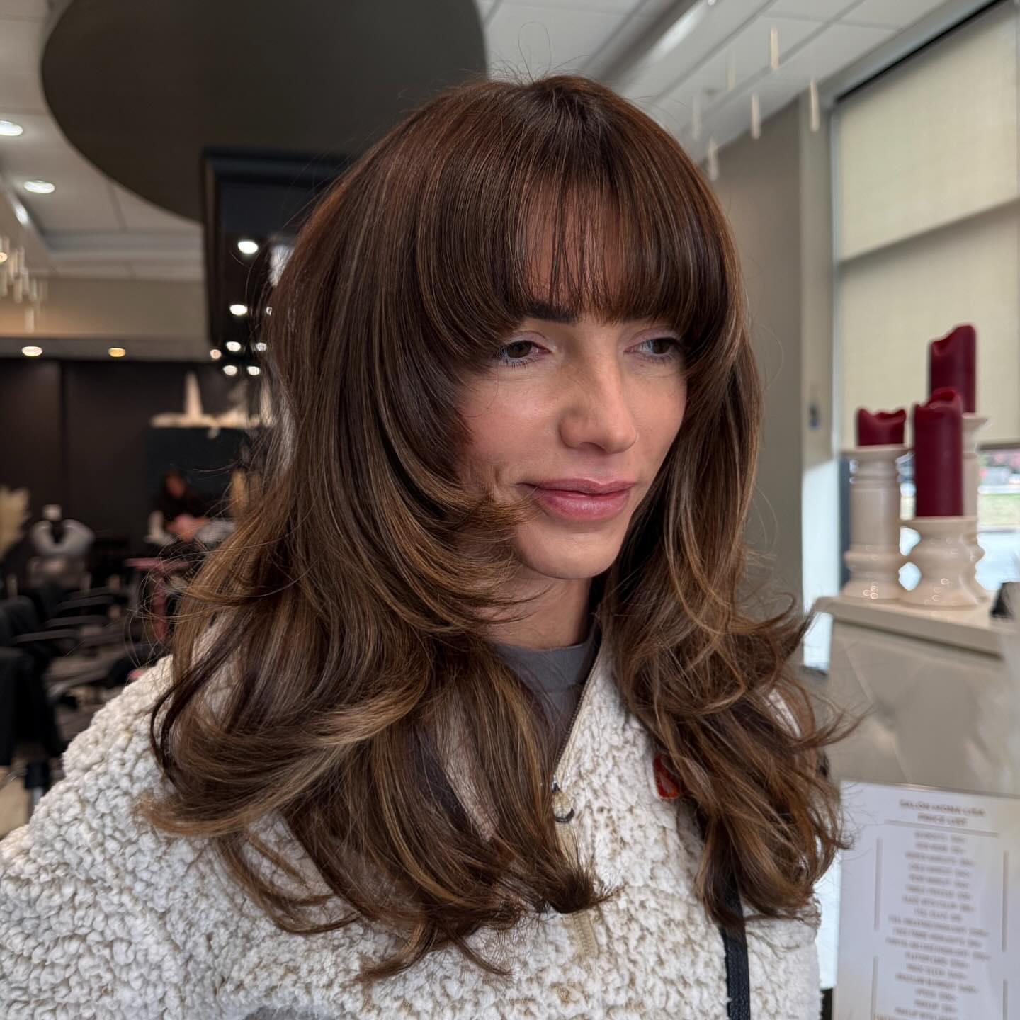 Glamorous Brunette Layers with Bold Bangs