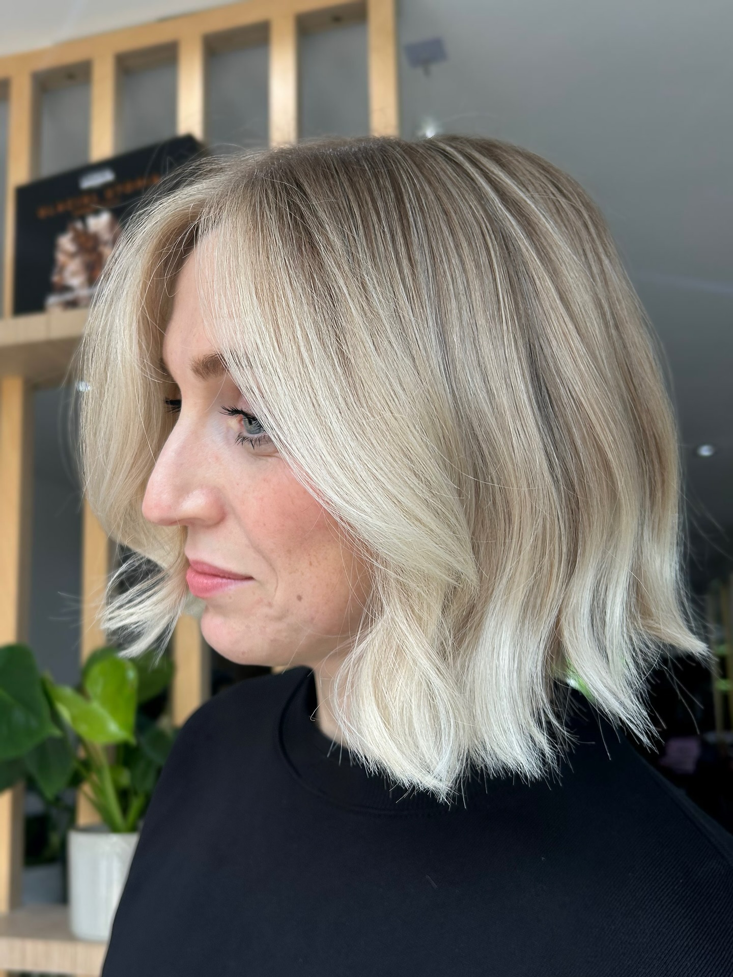 Glossy Cool Toned Blonde Bob with Soft Textured Ends
