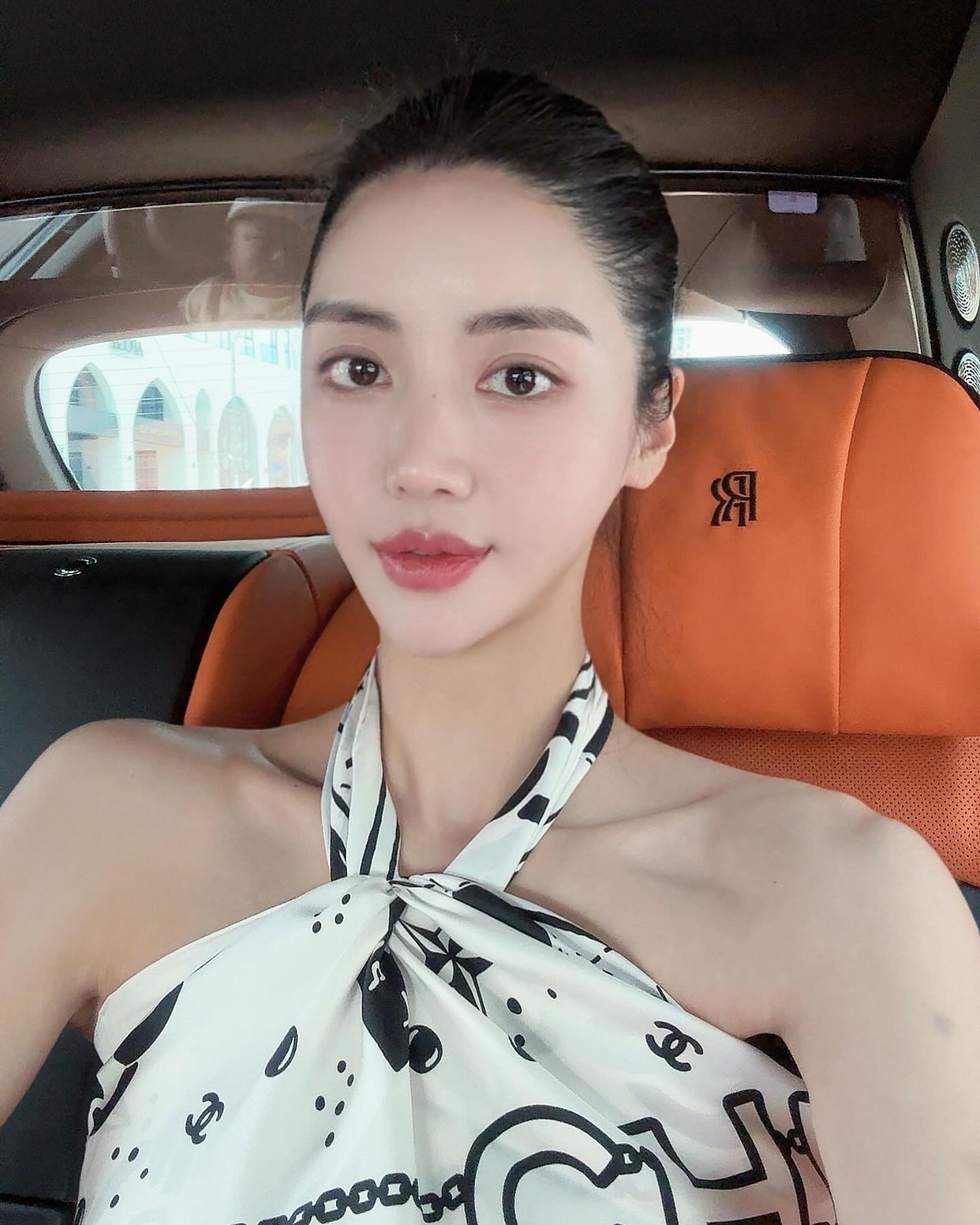 Glossy High Shine Slicked-Back Look