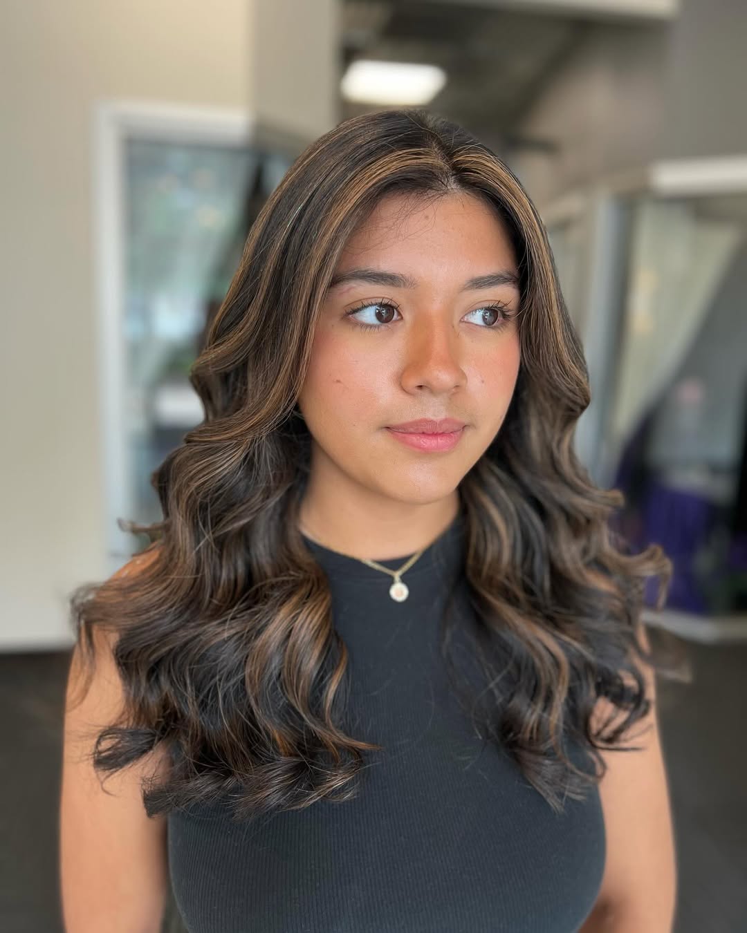 Layered Brunette Curls with Soft Caramel Highlights