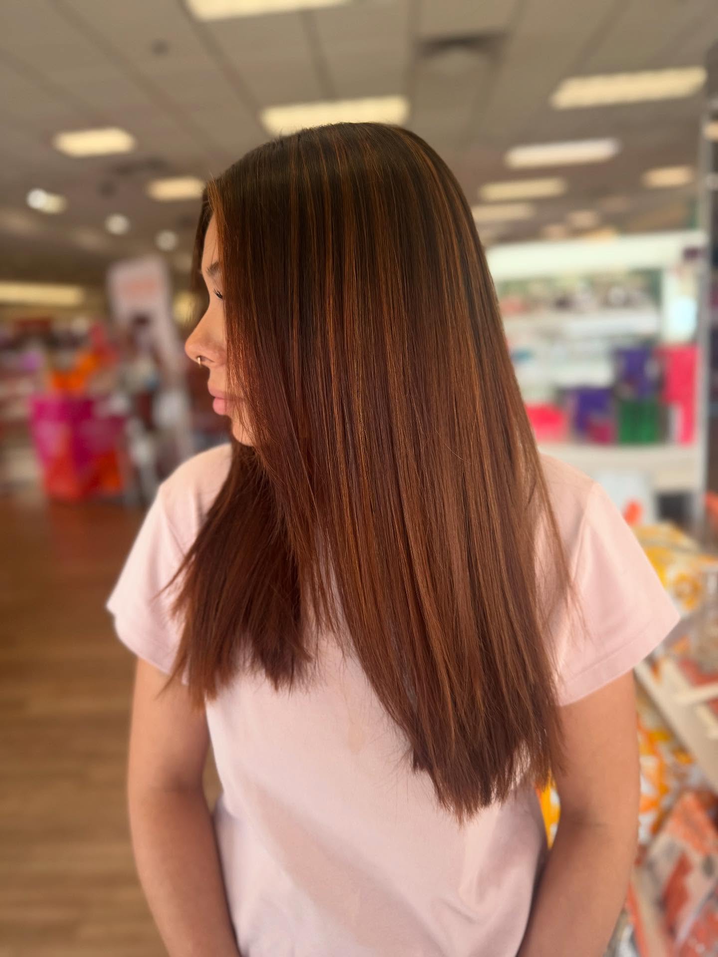 Long Sleek Hair with Subtle Caramel Highlights