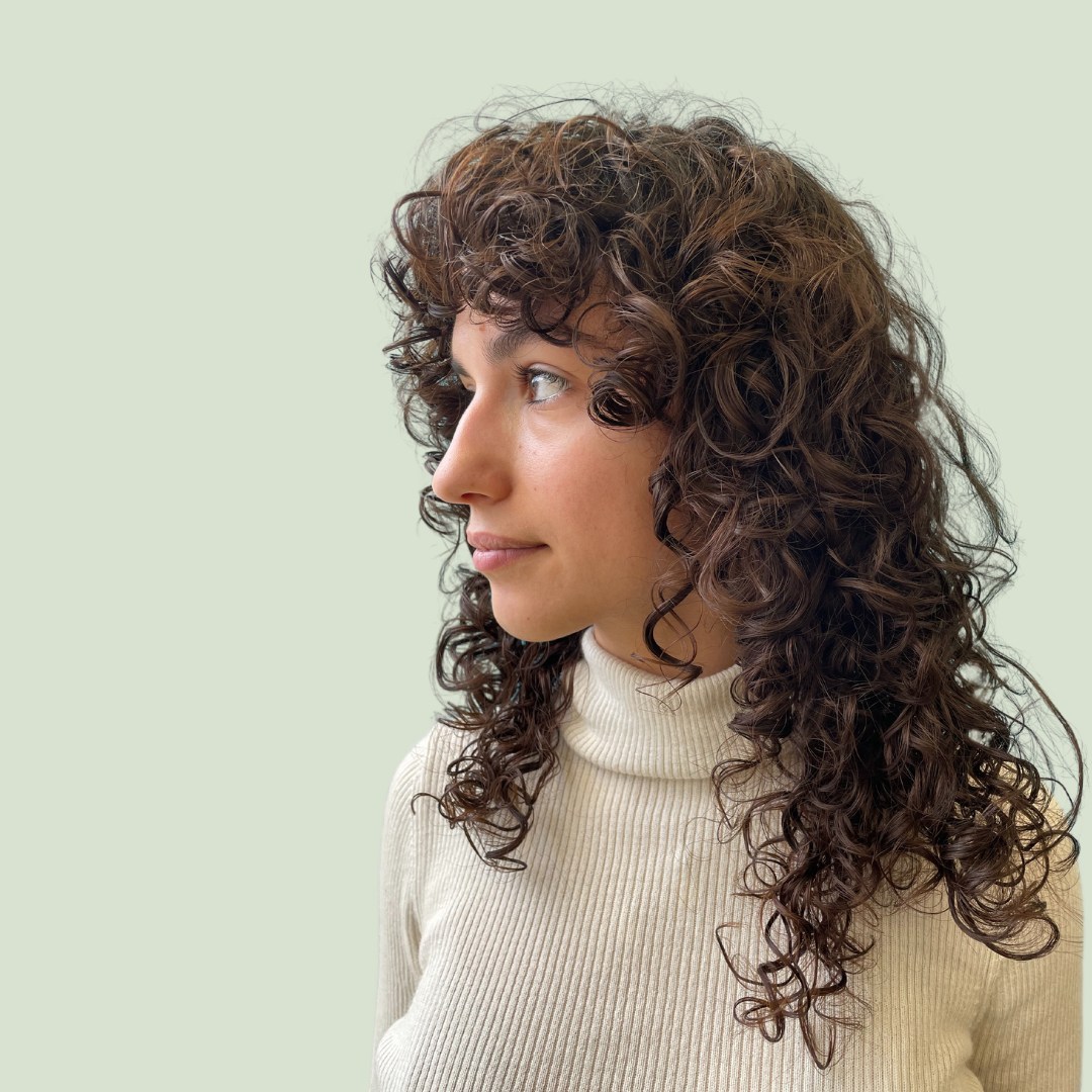 Modern Curly Wolfcut with Defined Layers