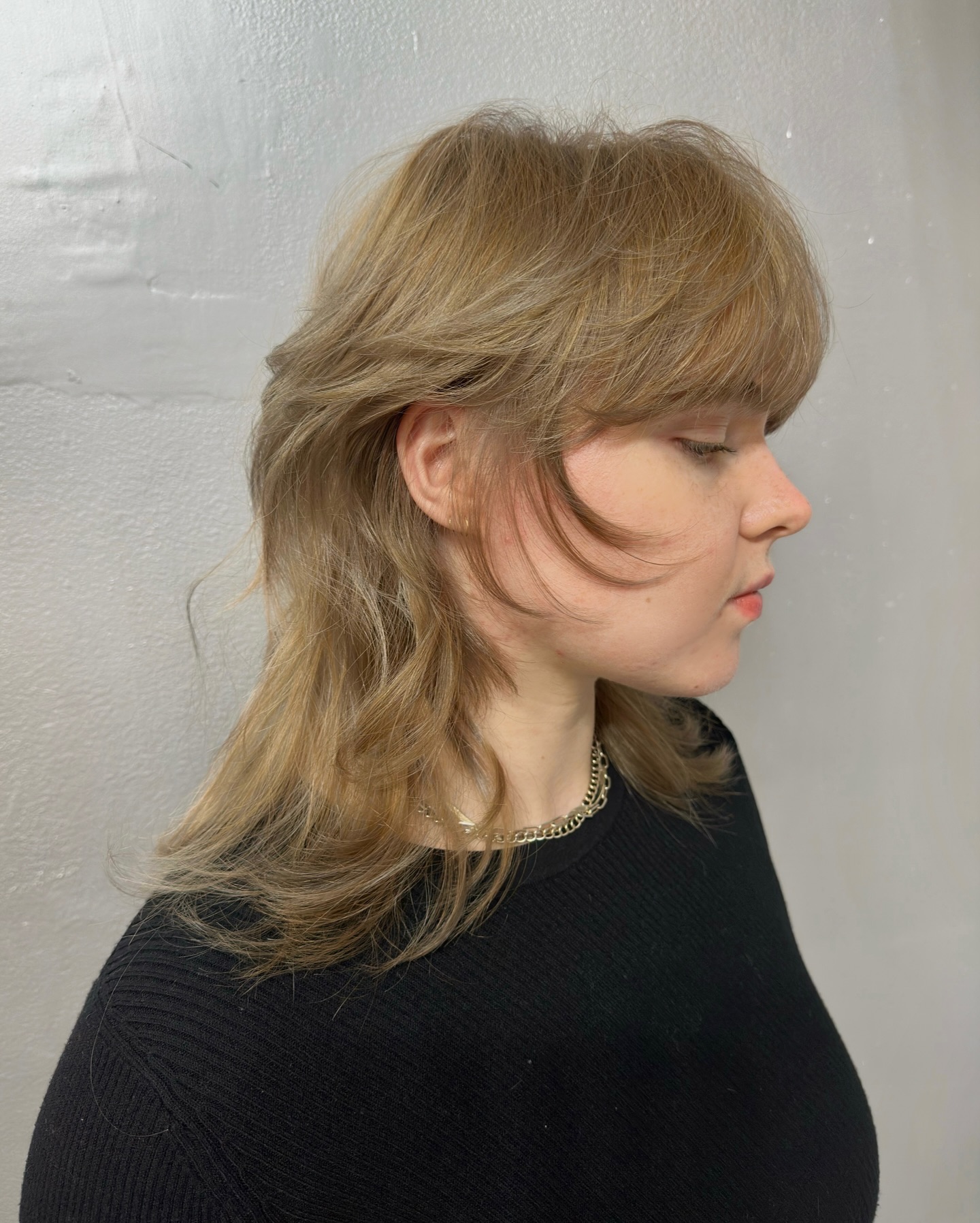Muted-Gold Tousled Layers with Soft Fringe