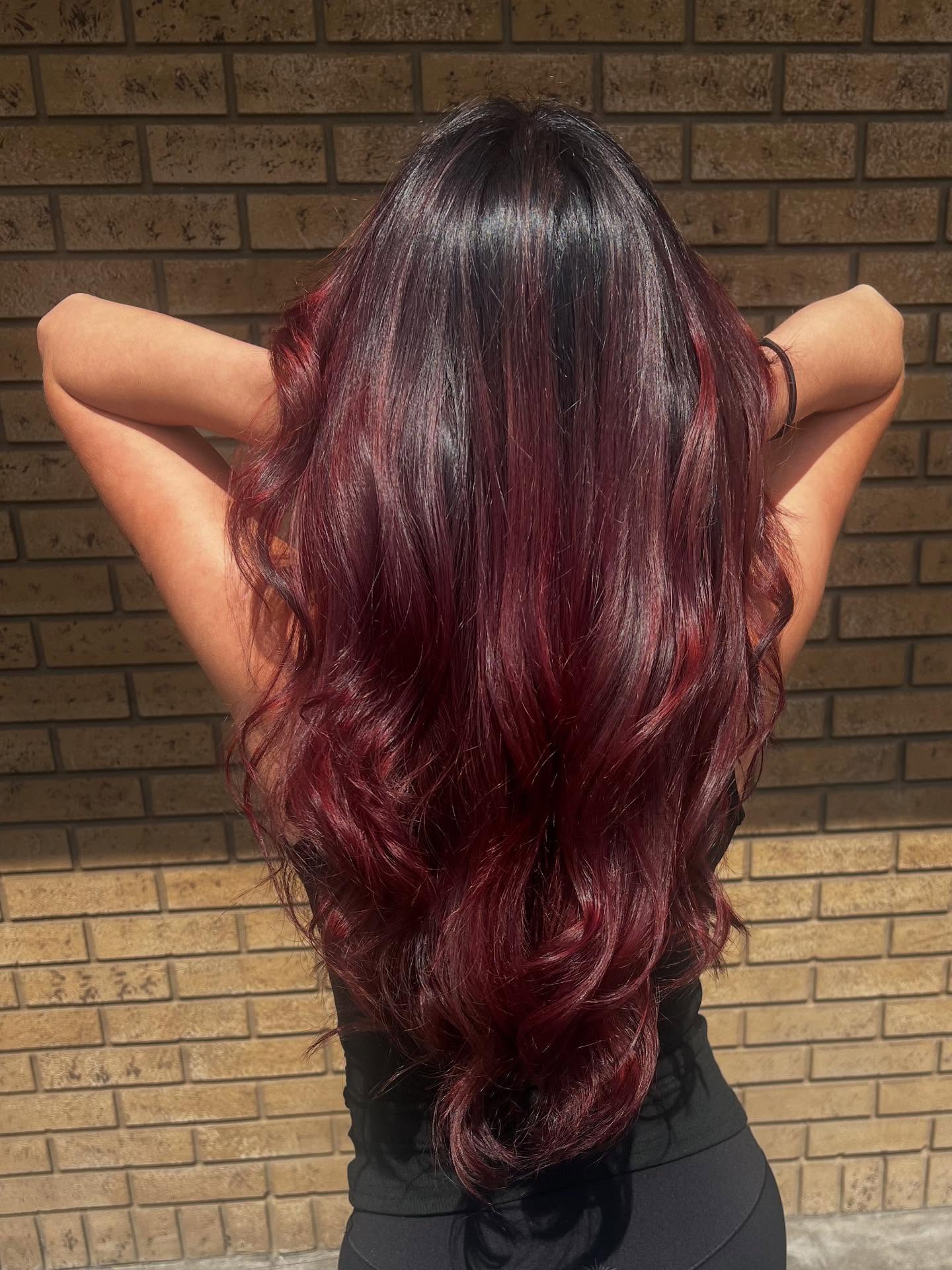Rich Cherry Chocolate Balayage with Loose Waves