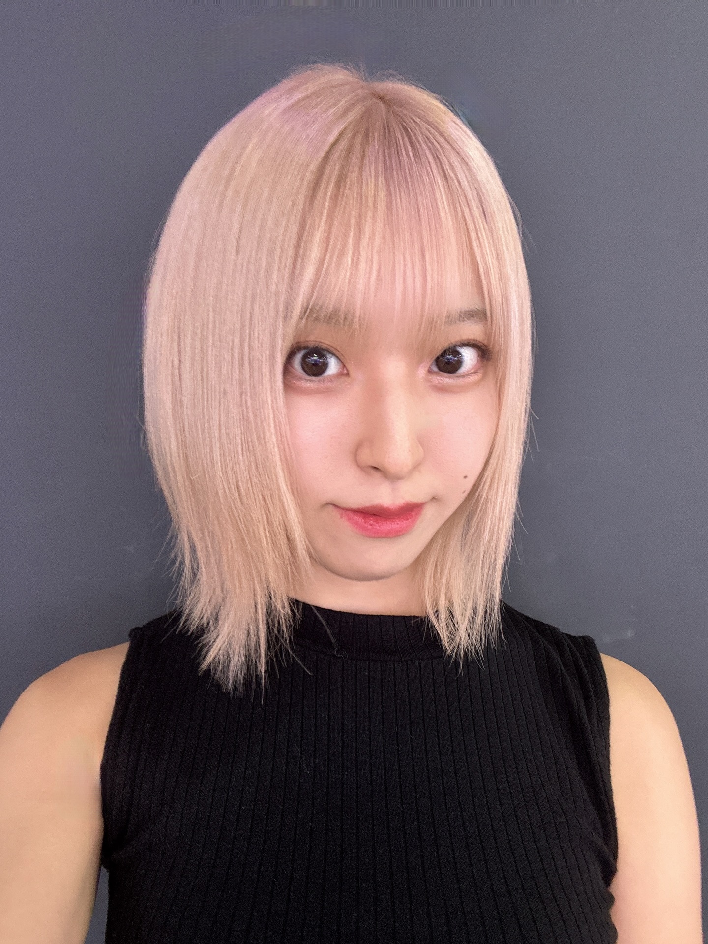 Sharp Blunt Bob with Pink Pastel Balayage