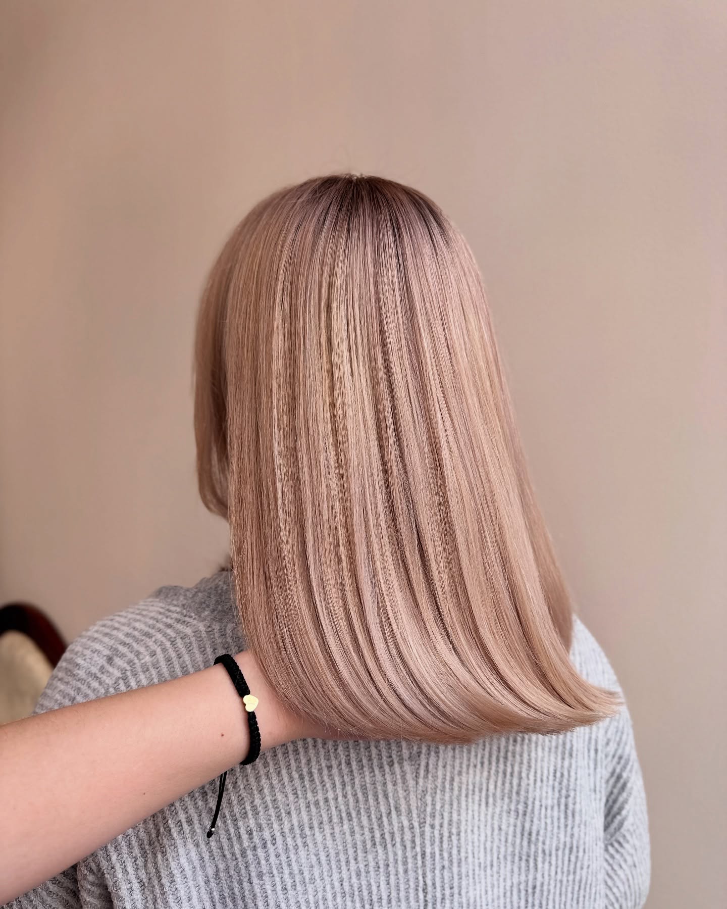Sleek Blonde A-Line Bob with Pink Undertones