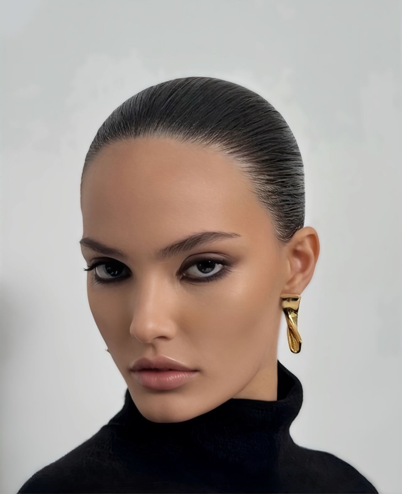 Sleek Tailored Wet-Look Slick Back