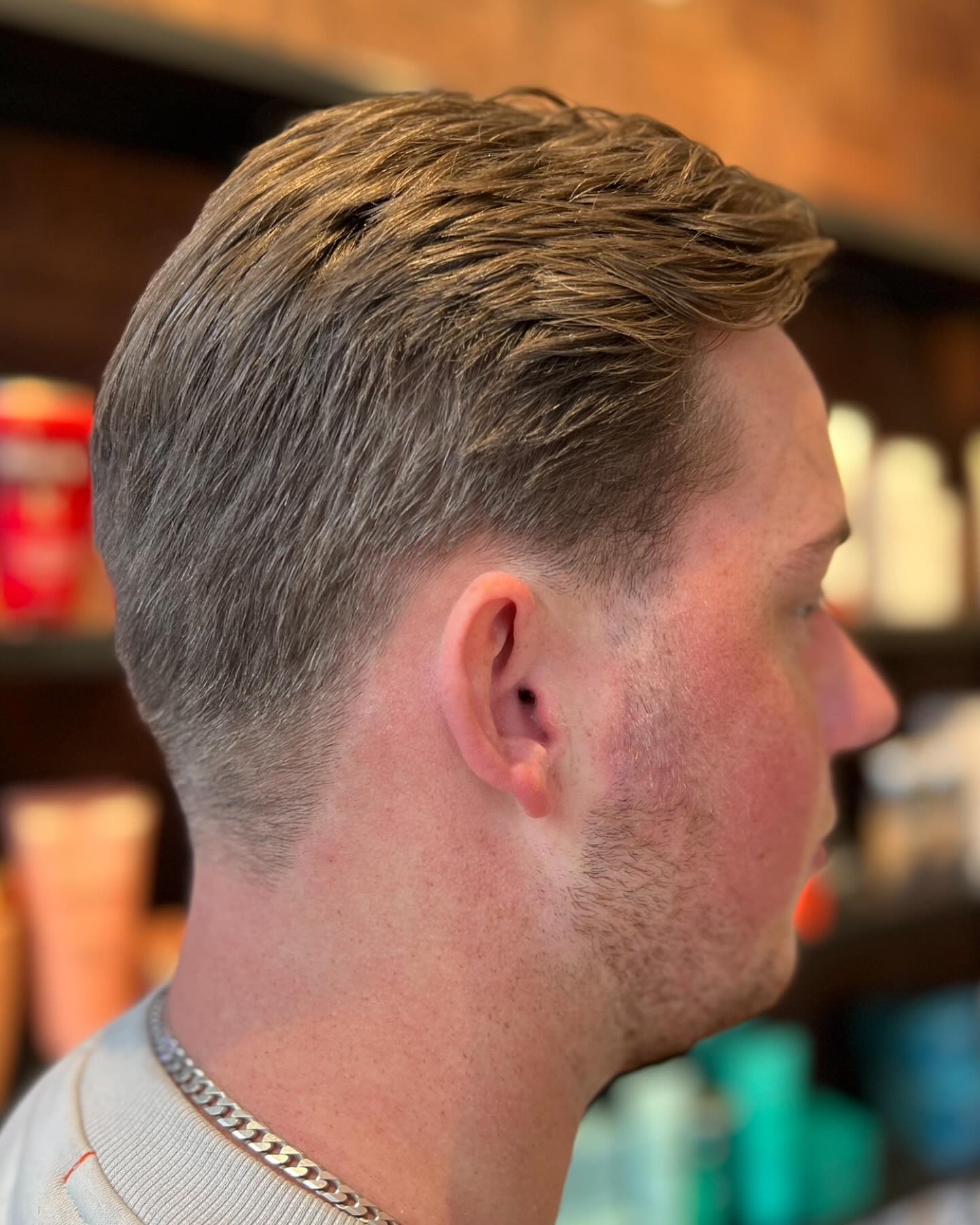 Sleek Textured Quiff with Tapered Sides