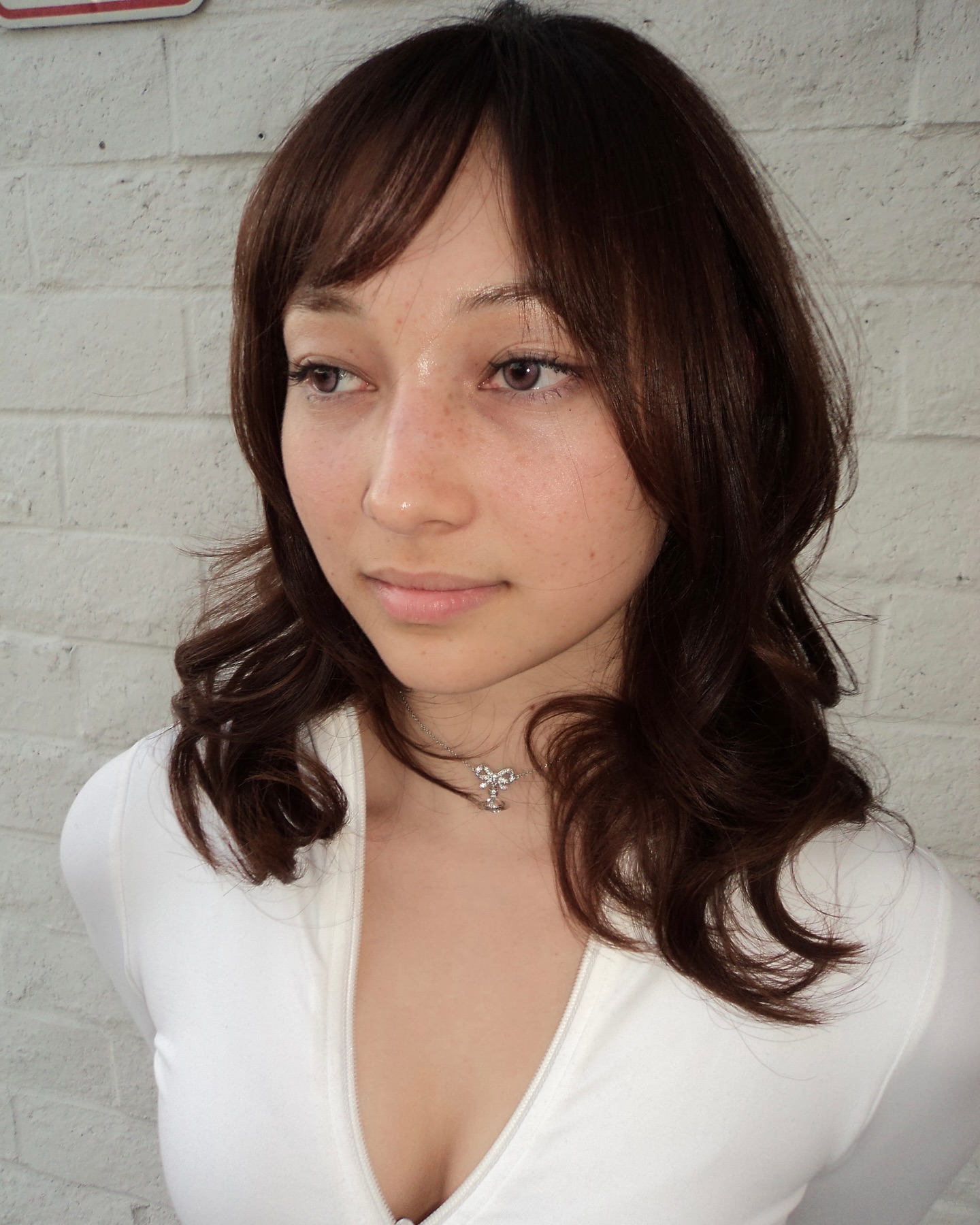 Softly Layered Mid-Length Cut with Side Bangs