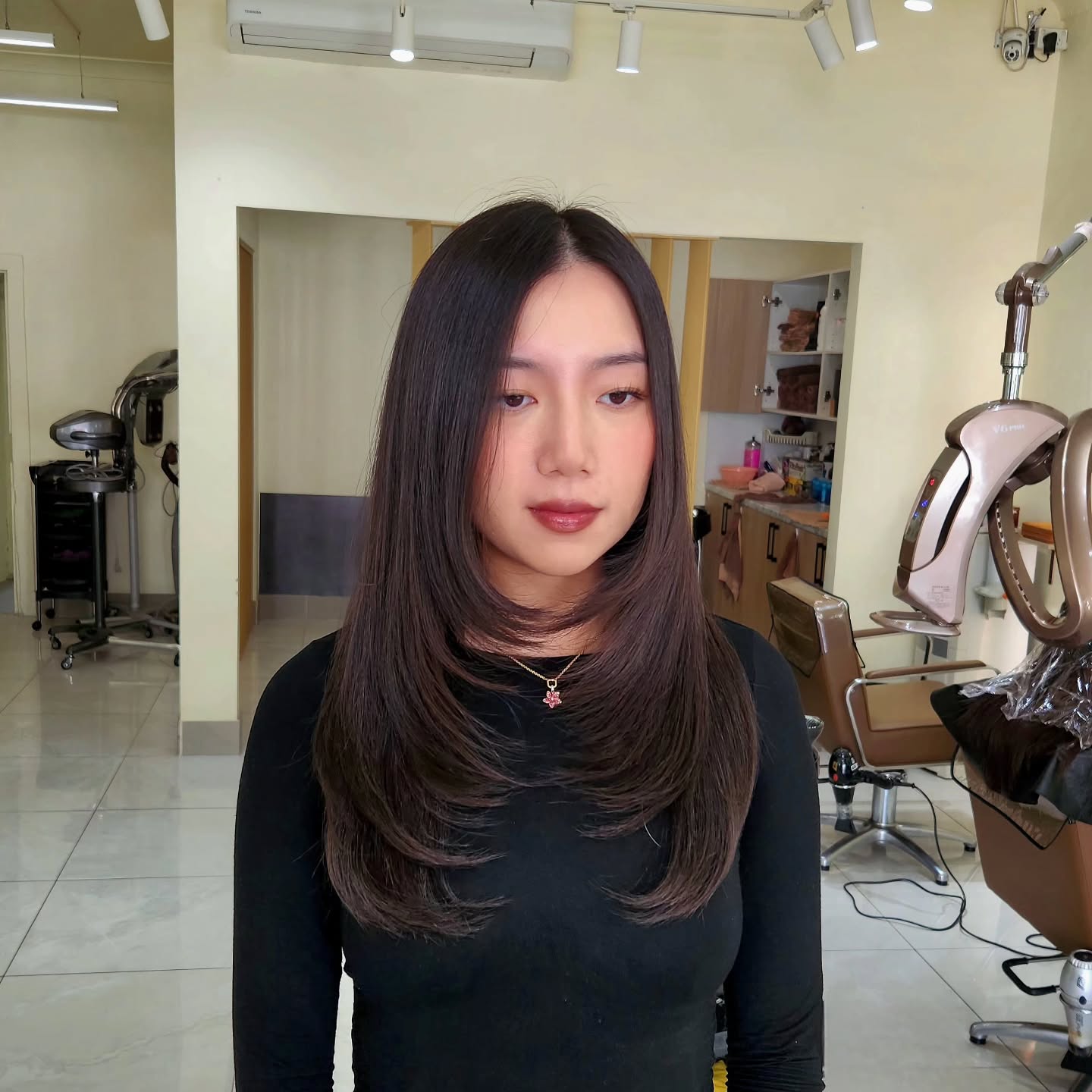 Stunning Face-Framing Layers for Sleek Long Hair