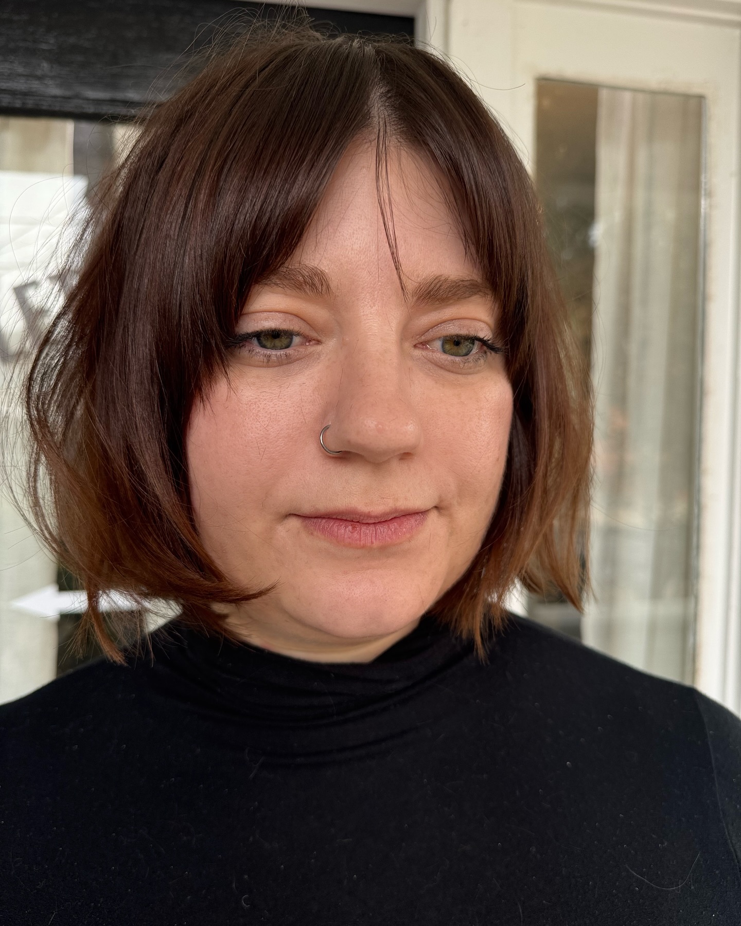 Subtle Cinnamon Swirl Bob with Soft Fringe