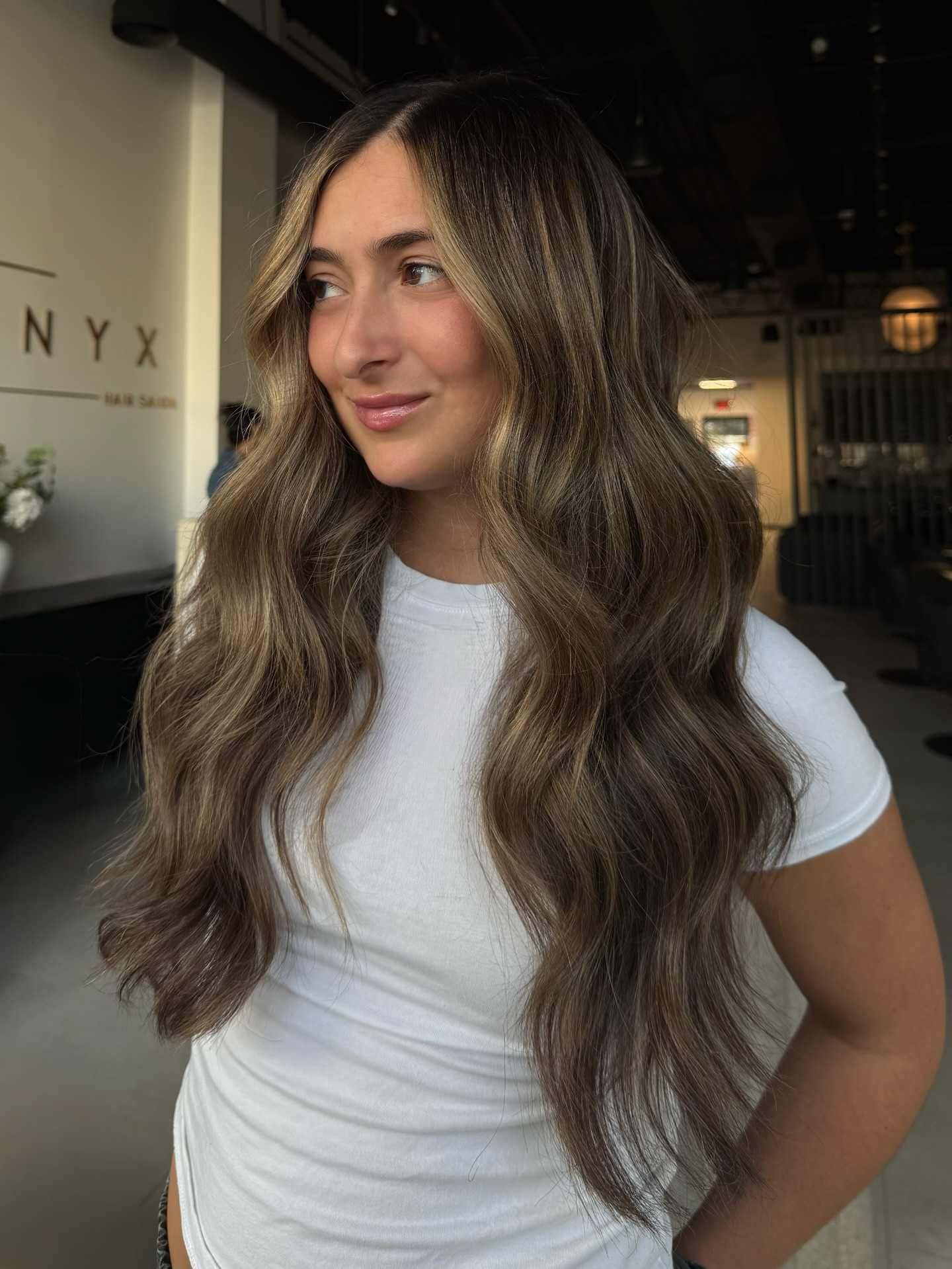 Sun-Kissed Blonde Balayage with Defined Waves