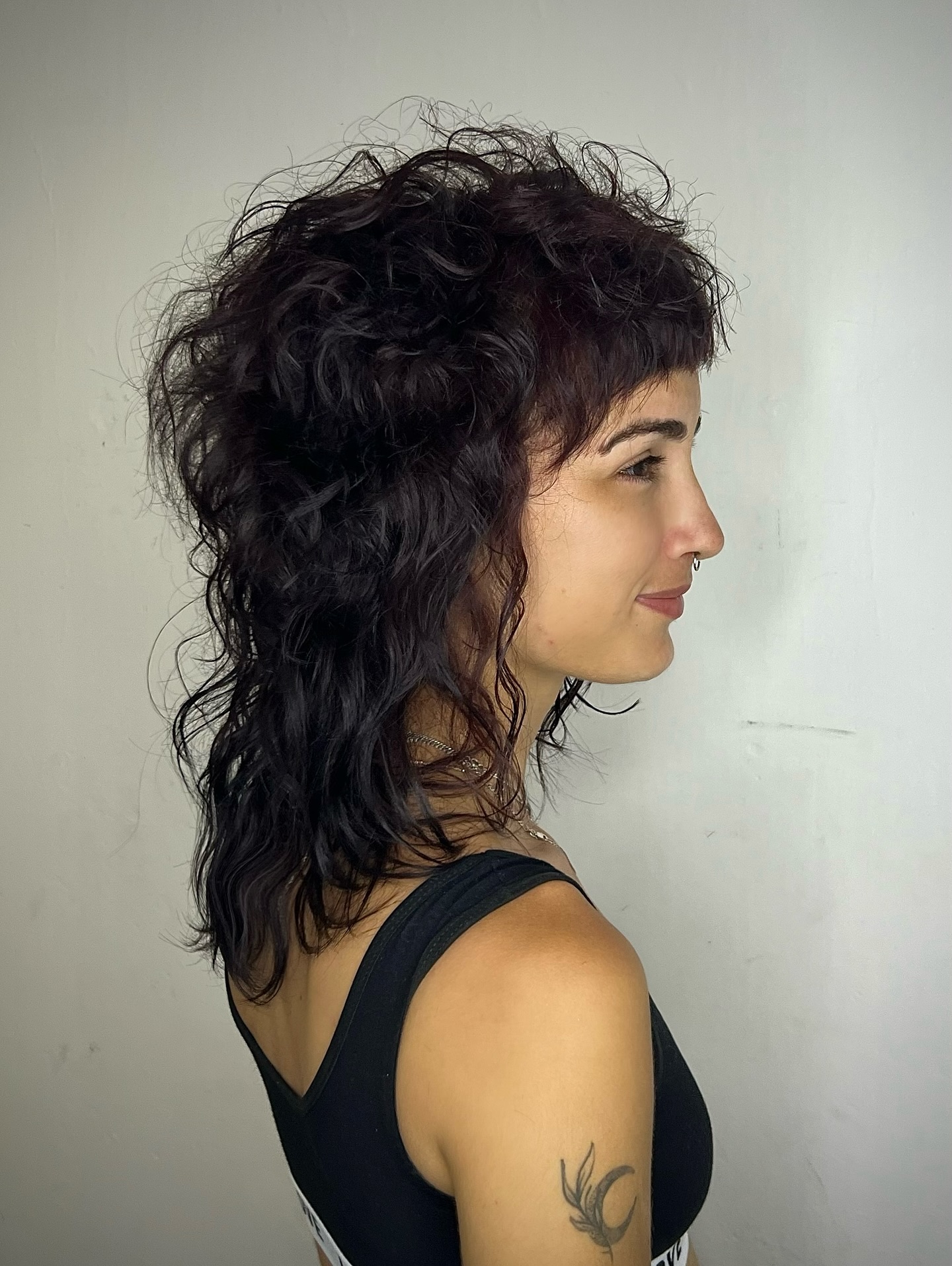 Textured Curly Wolfcut with Soft Bangs