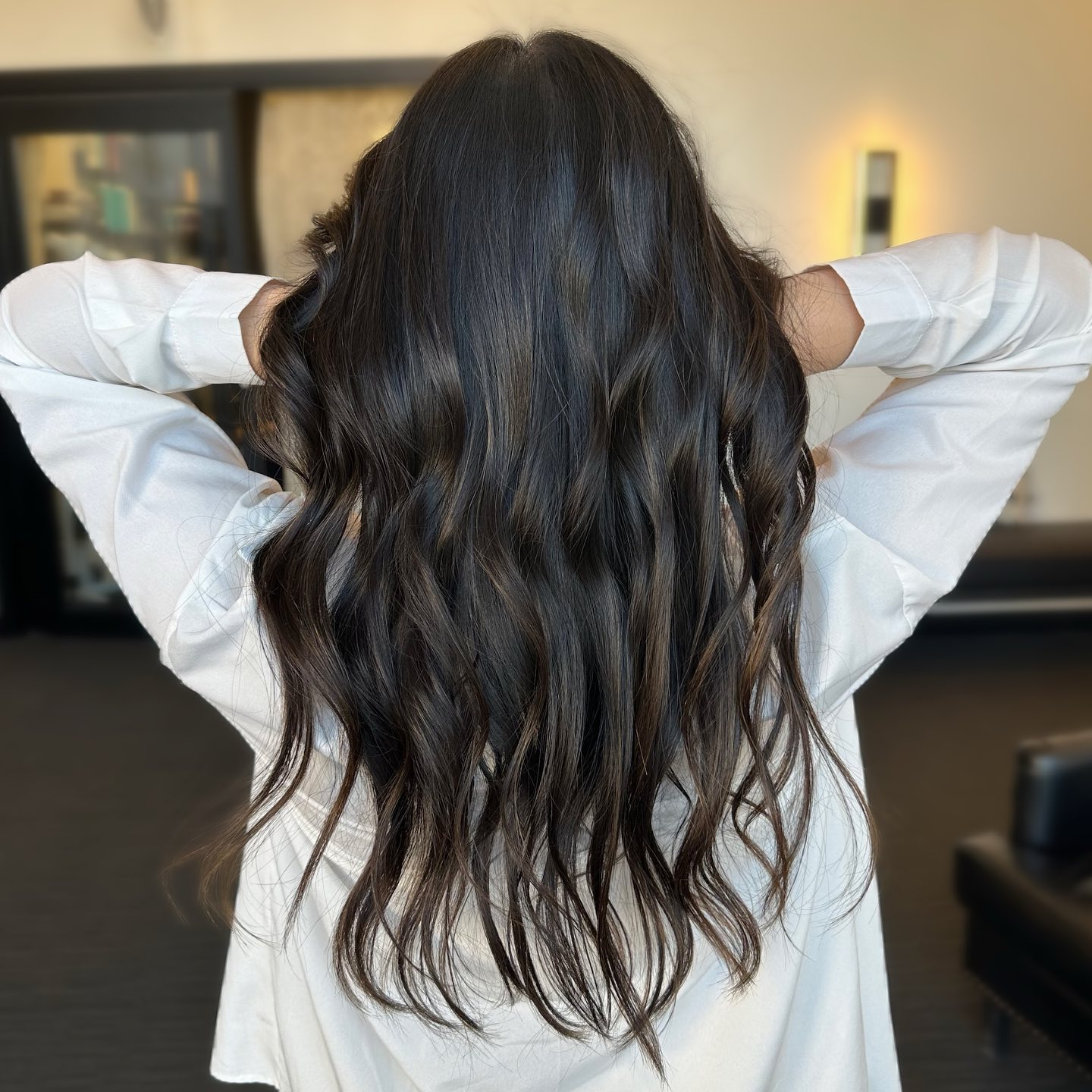 Textured Long Brunette Waves with Warm Highlights