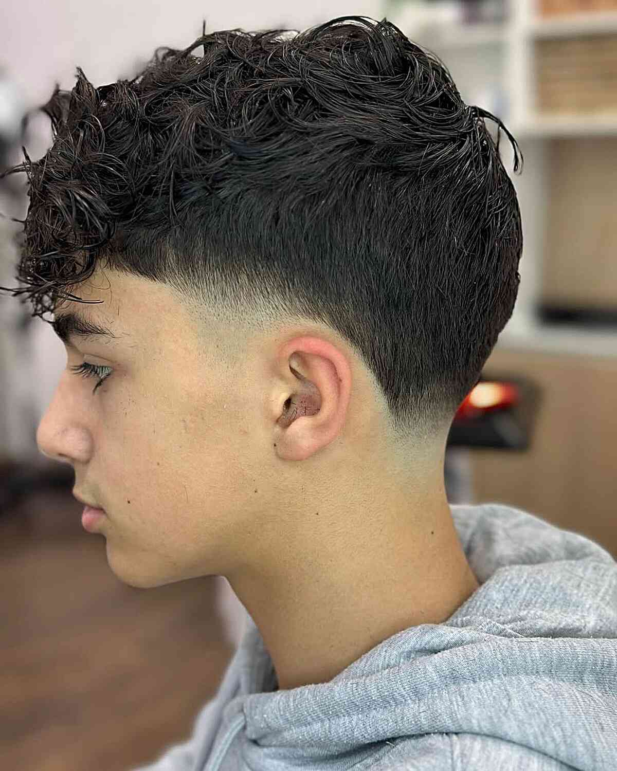 Trendy Taper Fade with Defined Curls