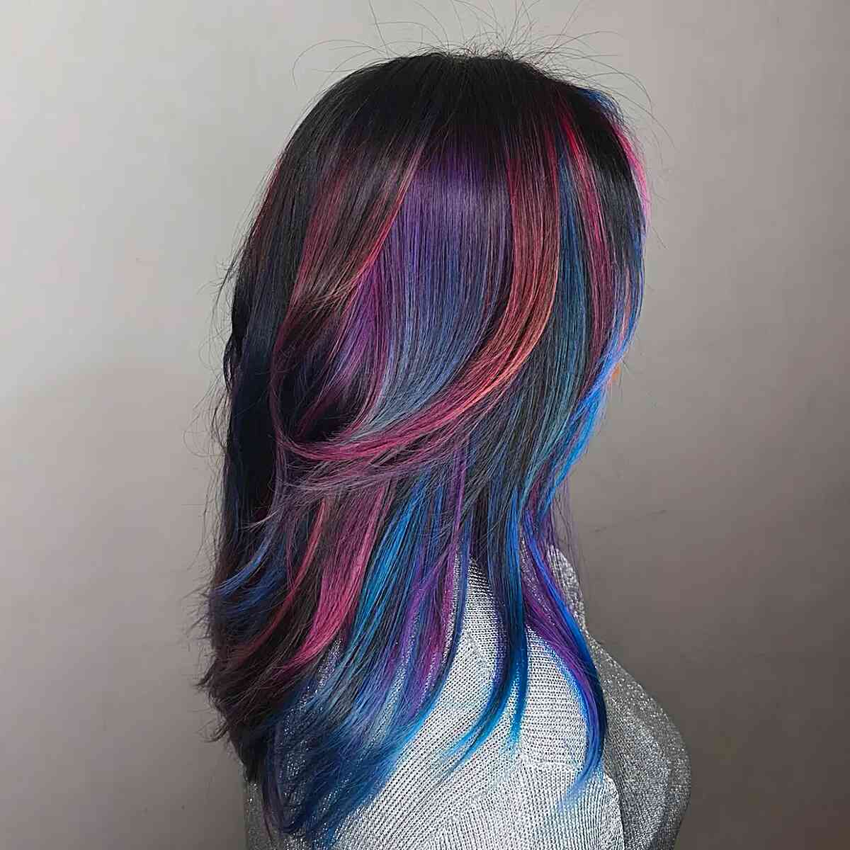 Vibrant Galaxy-Inspired Hair with Bold Color Strands