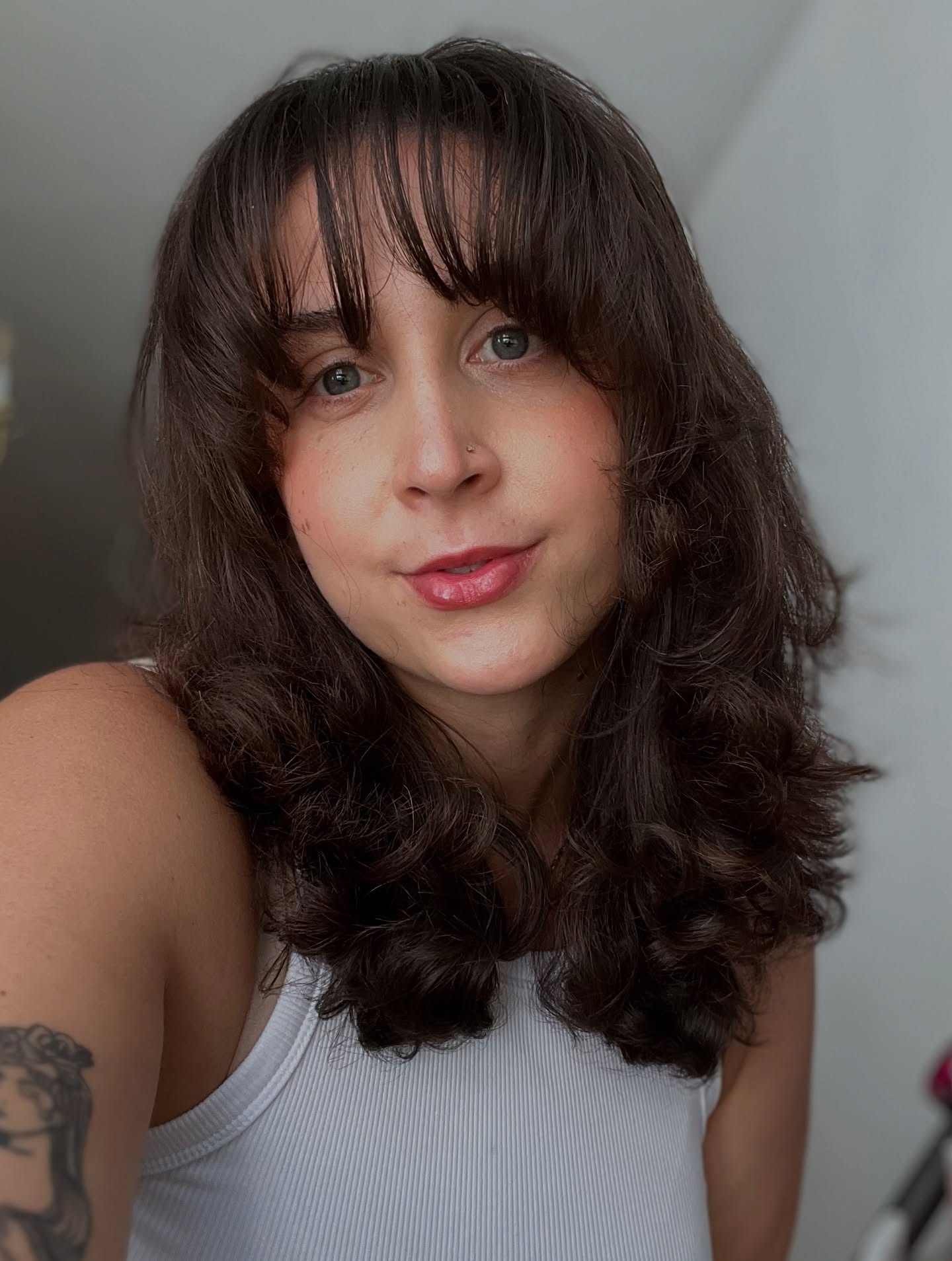 Bouncy Chestnut Curls with Feathered Fringe