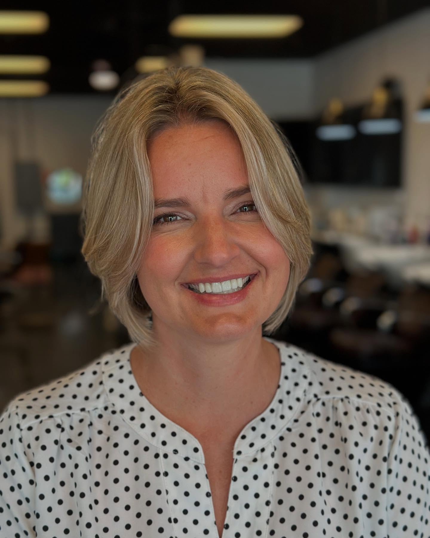 Chic Bob with Face-Framing Highlights and Subtle Layers