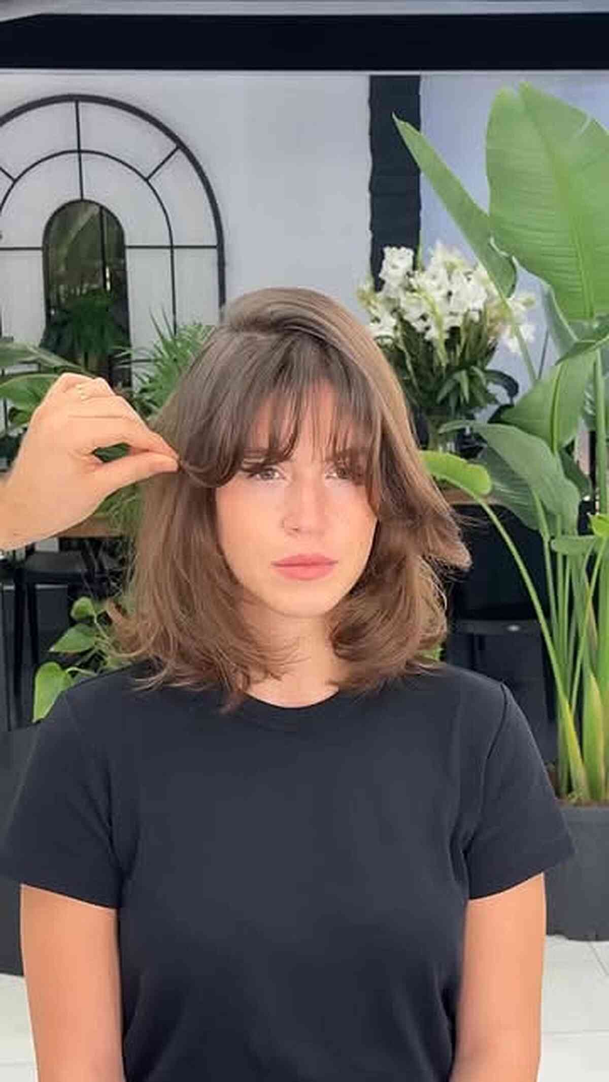 Effortlessly Chic Medium-Length Layered Cut with Fringe