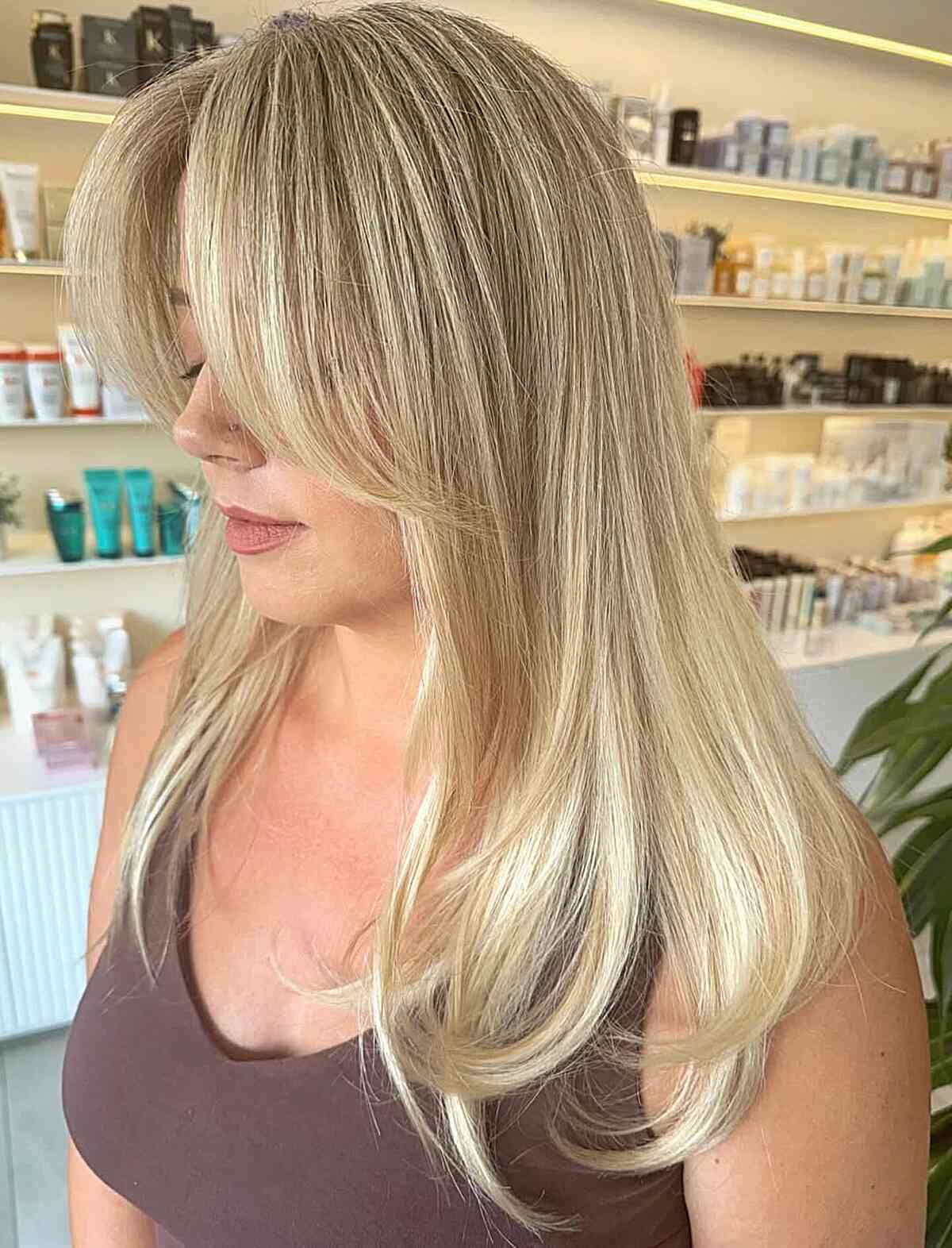 Long Layered Barbie Blonde with Soft Face-Framing Bangs