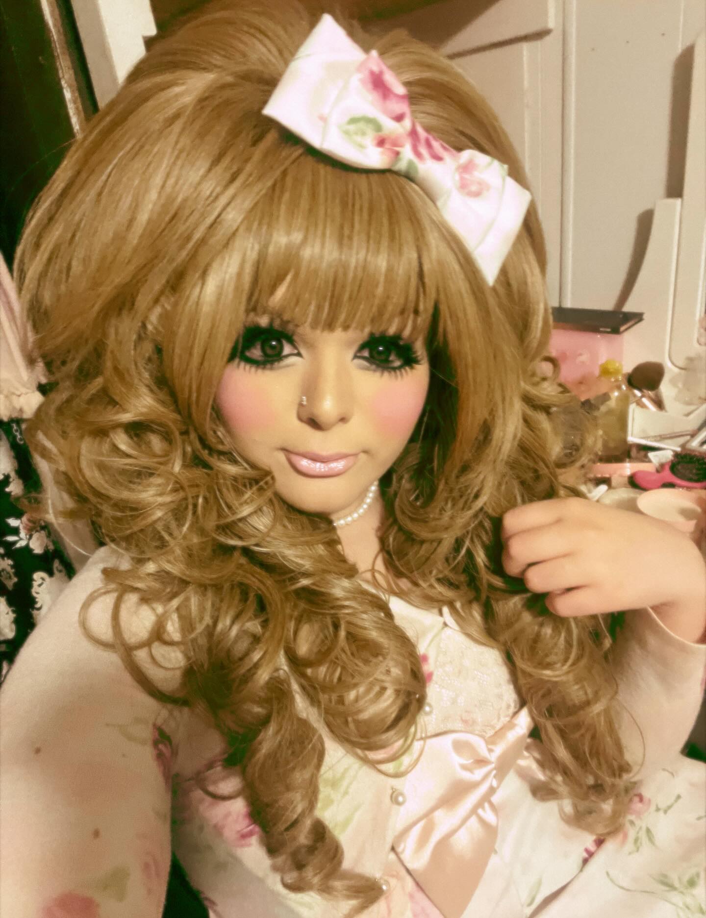 Luxe Golden Spiral Curls with Delicate Floral Bow