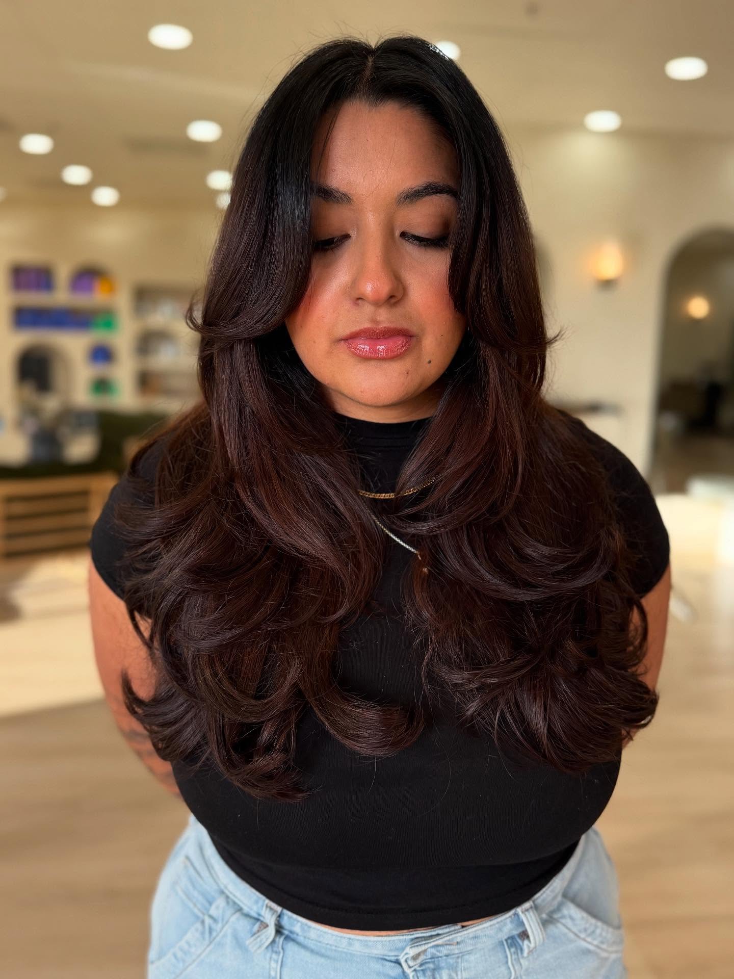 Luxurious Chestnut Waves with Face-Framing Highlights