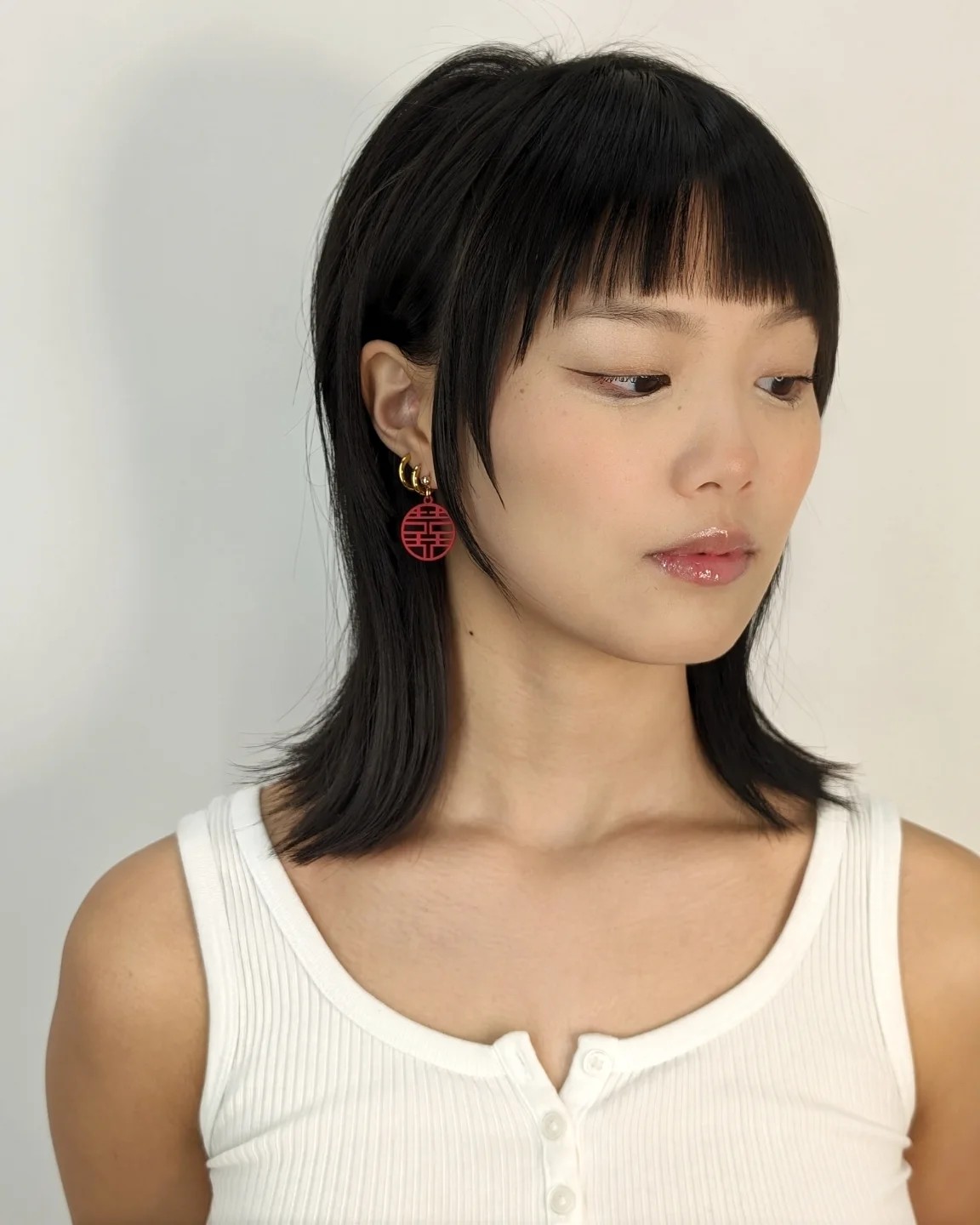 Sleek Jet-Black Bob with Precision Bangs