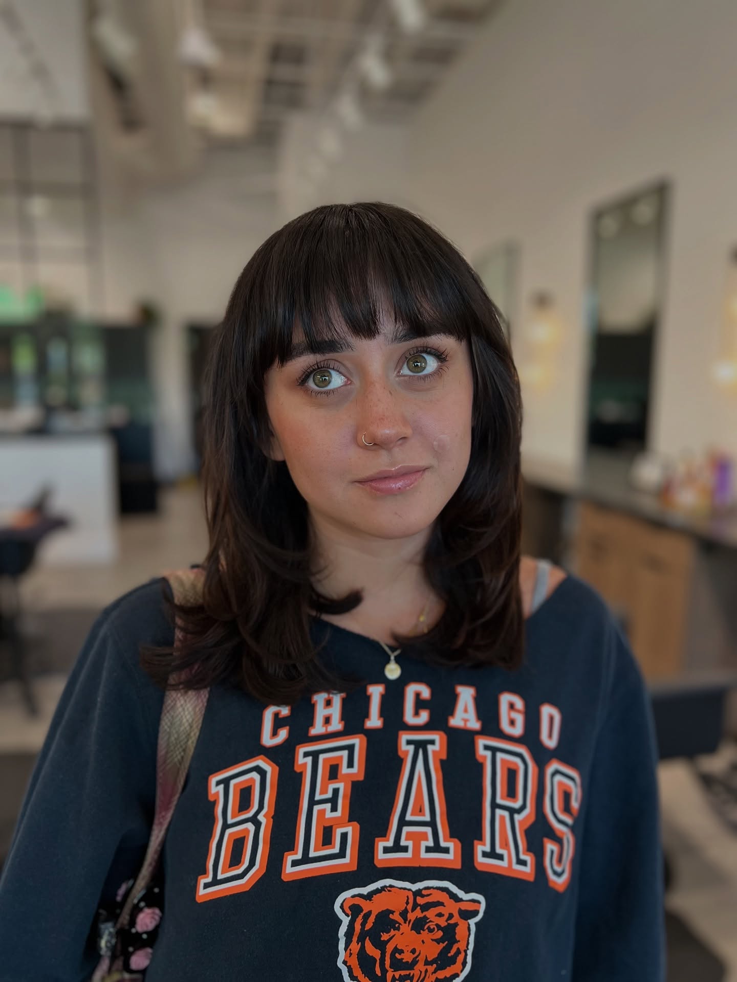 Sleek Jet-Black Bob with Full Straight Bangs