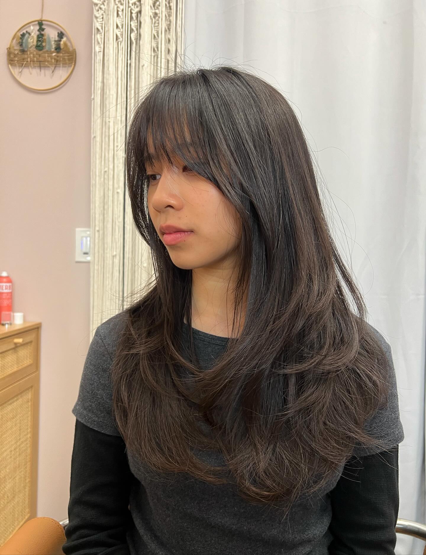 Subtle Ebony Waves with Wispy Bangs