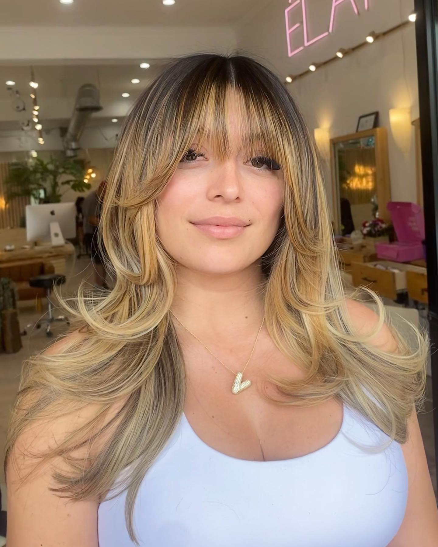 Sunkissed Caramel Waves with Curtain Bangs