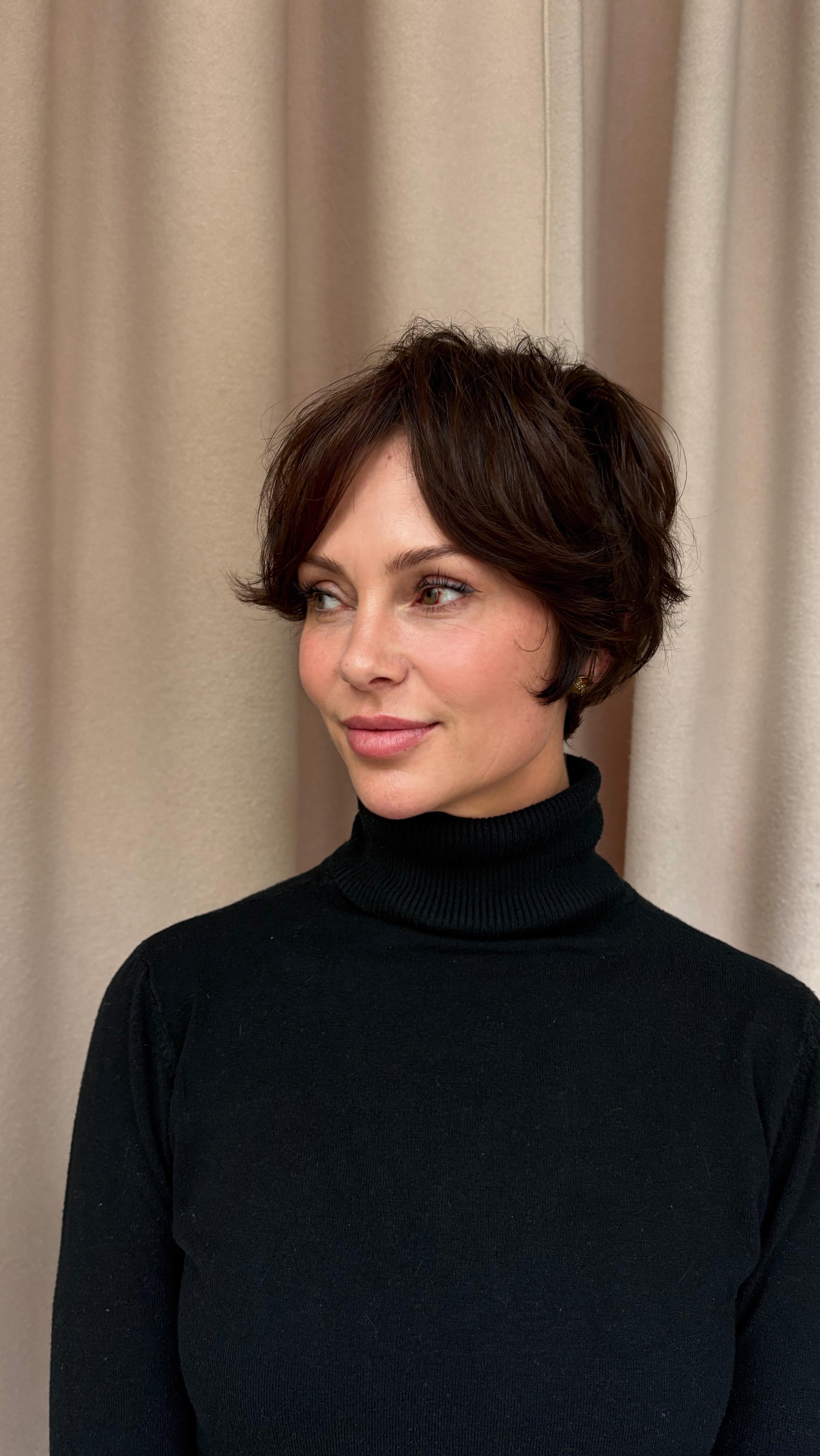 Chic Brown Pixie with Soft Waves and Subtle Layers