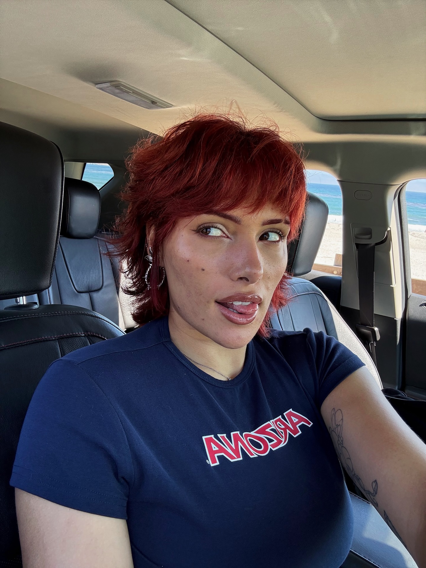 Bright Auburn Textured Pixie with Side-Swept Bangs