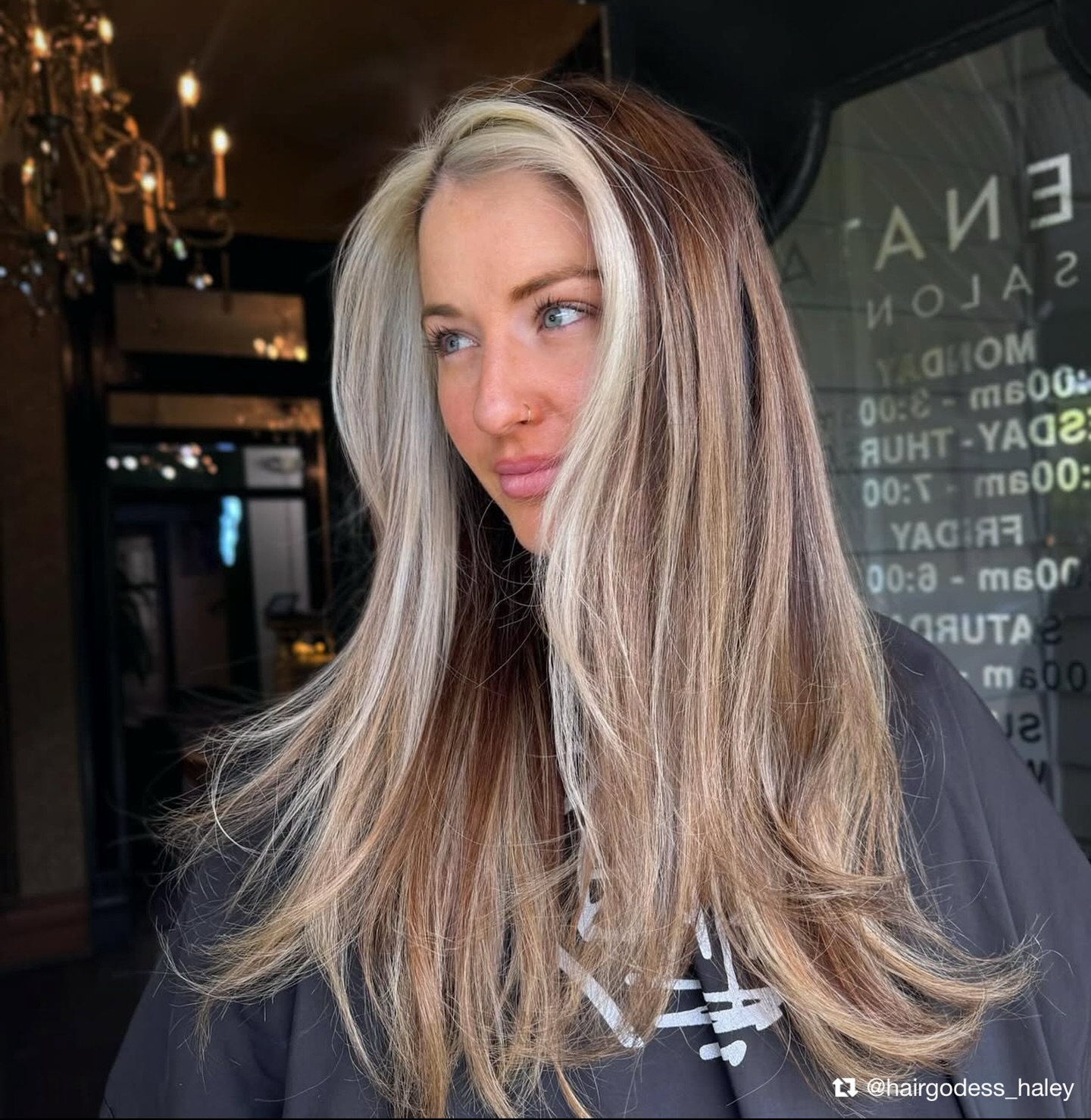 Bright Blonde Layers with Delicate Face-Framing Strands