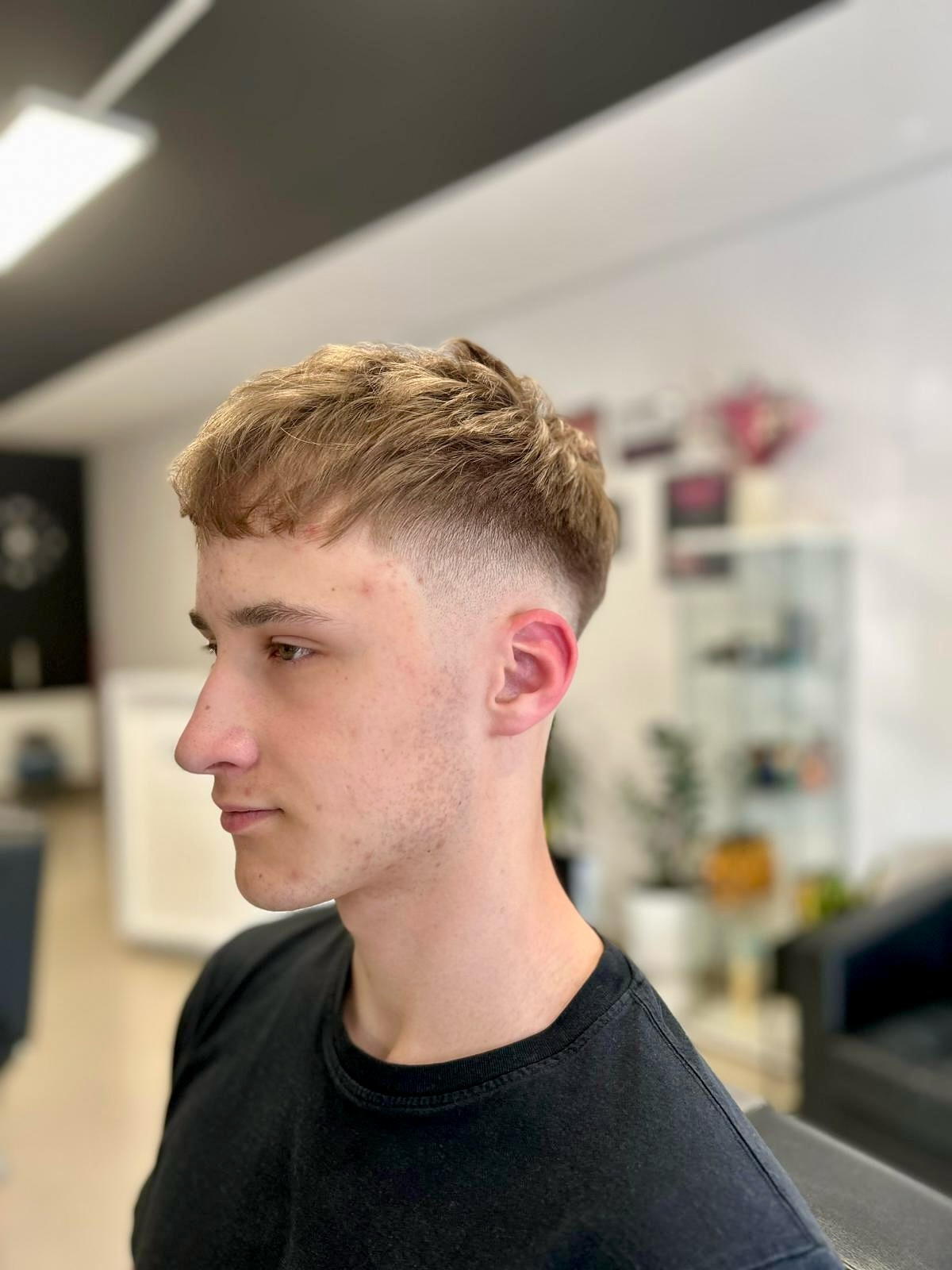 Chic Blonde Crop with Angular Lines and Tapered Nape