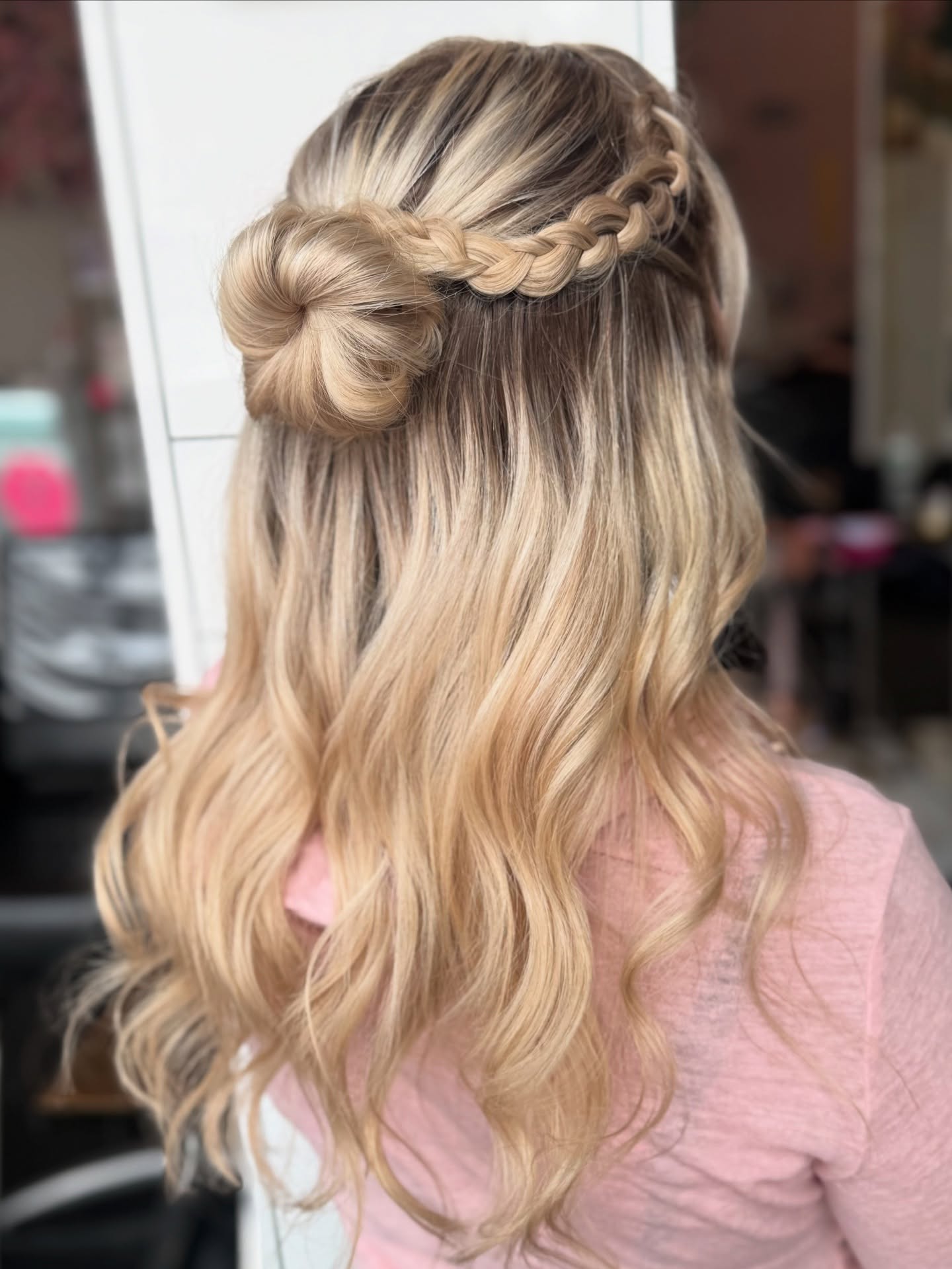 Chic Braided Bun with Cascading Golden Waves