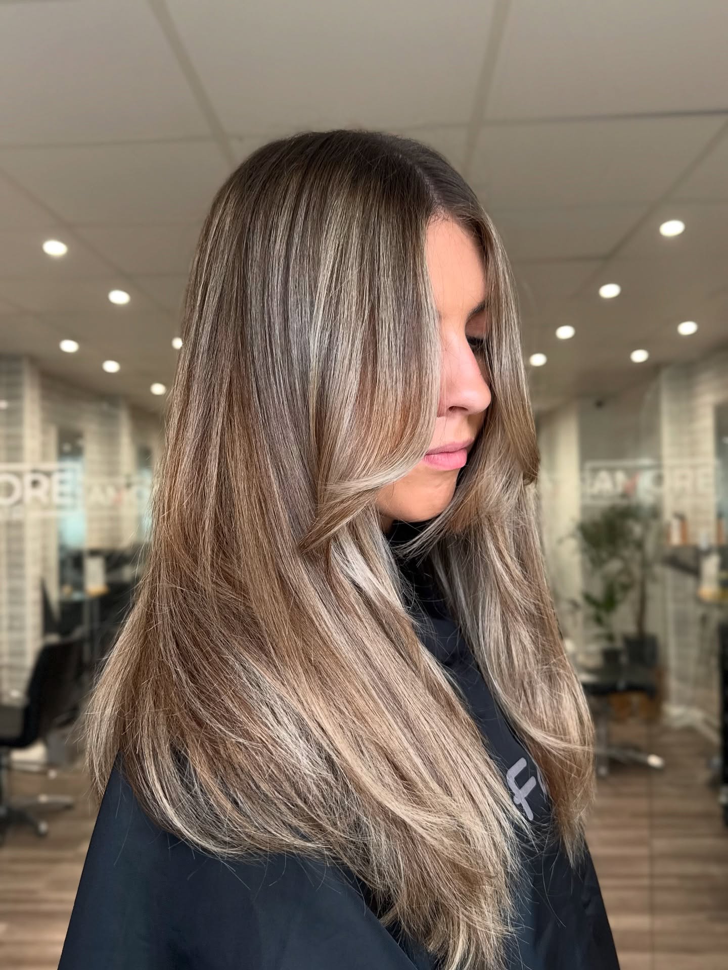 Chic Long Layered Cut with Subtle Highlights