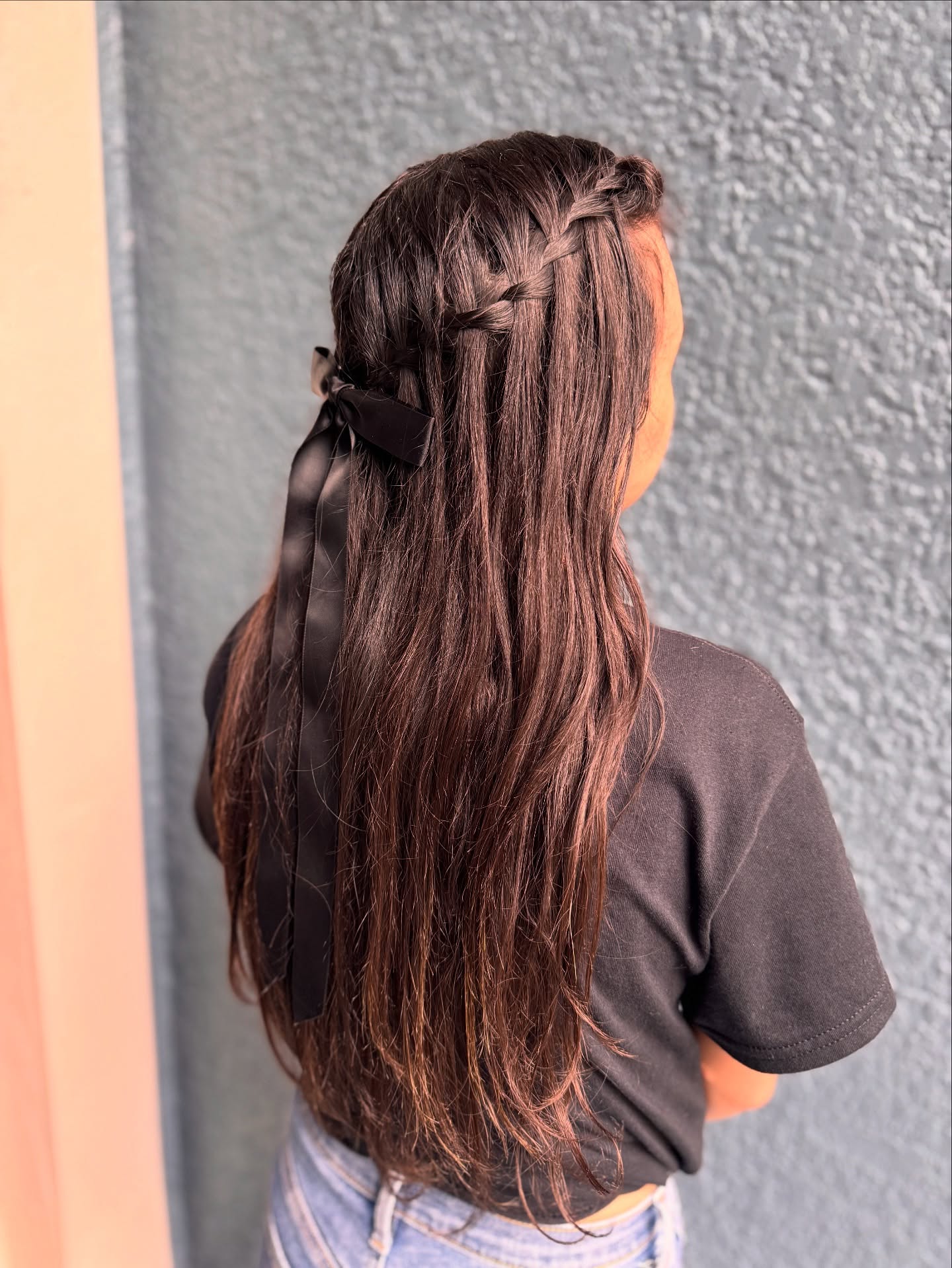 Chic Side-Swept Braid with Satin Ribbon Accents