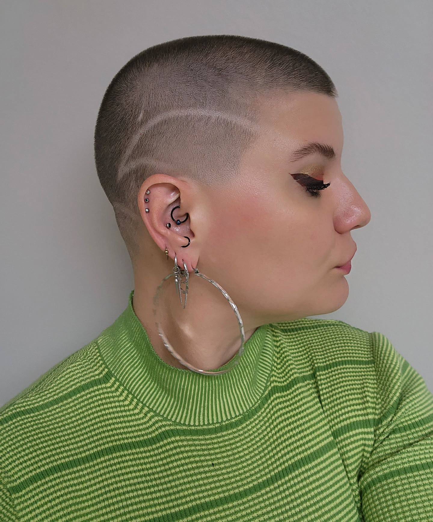 Chic Textured Buzz Cut with Bold Design