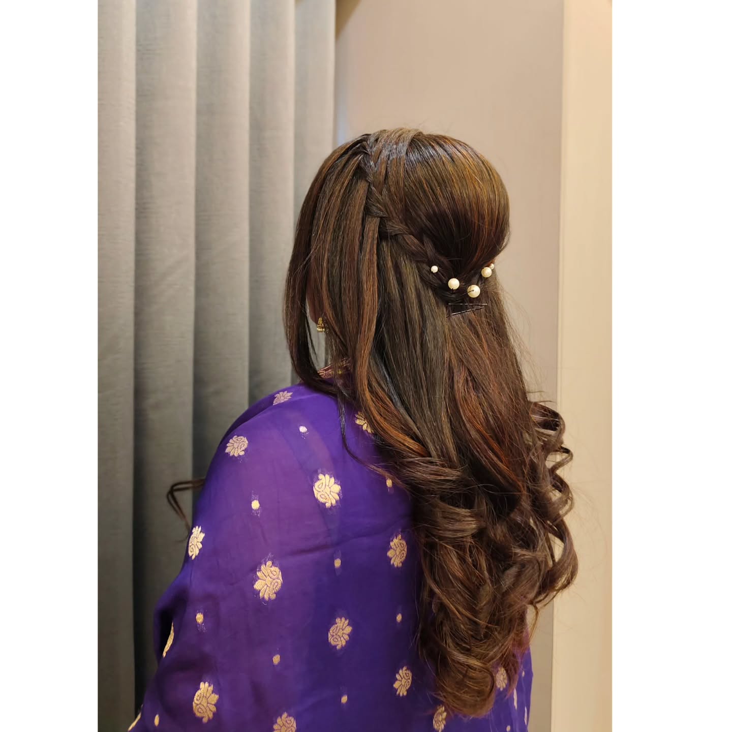 Elegant Flowing Locks with Subtle Braided Highlights