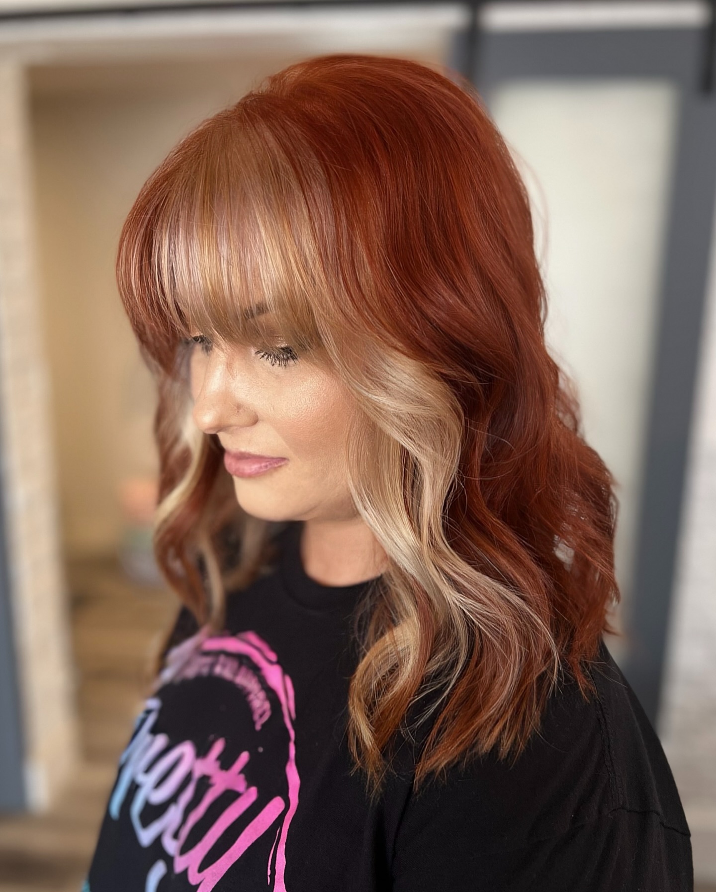 Glossy Copper Bob with Creamy Blonde Highlights