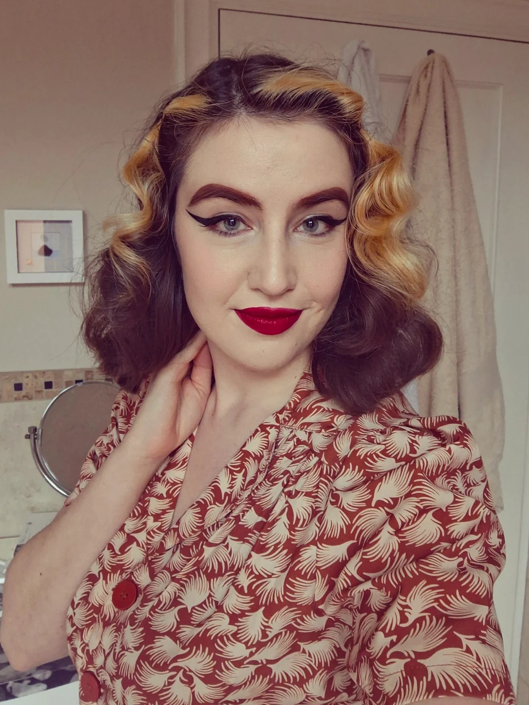Golden-Blonde Contrasting Rolls with Soft S-Curls