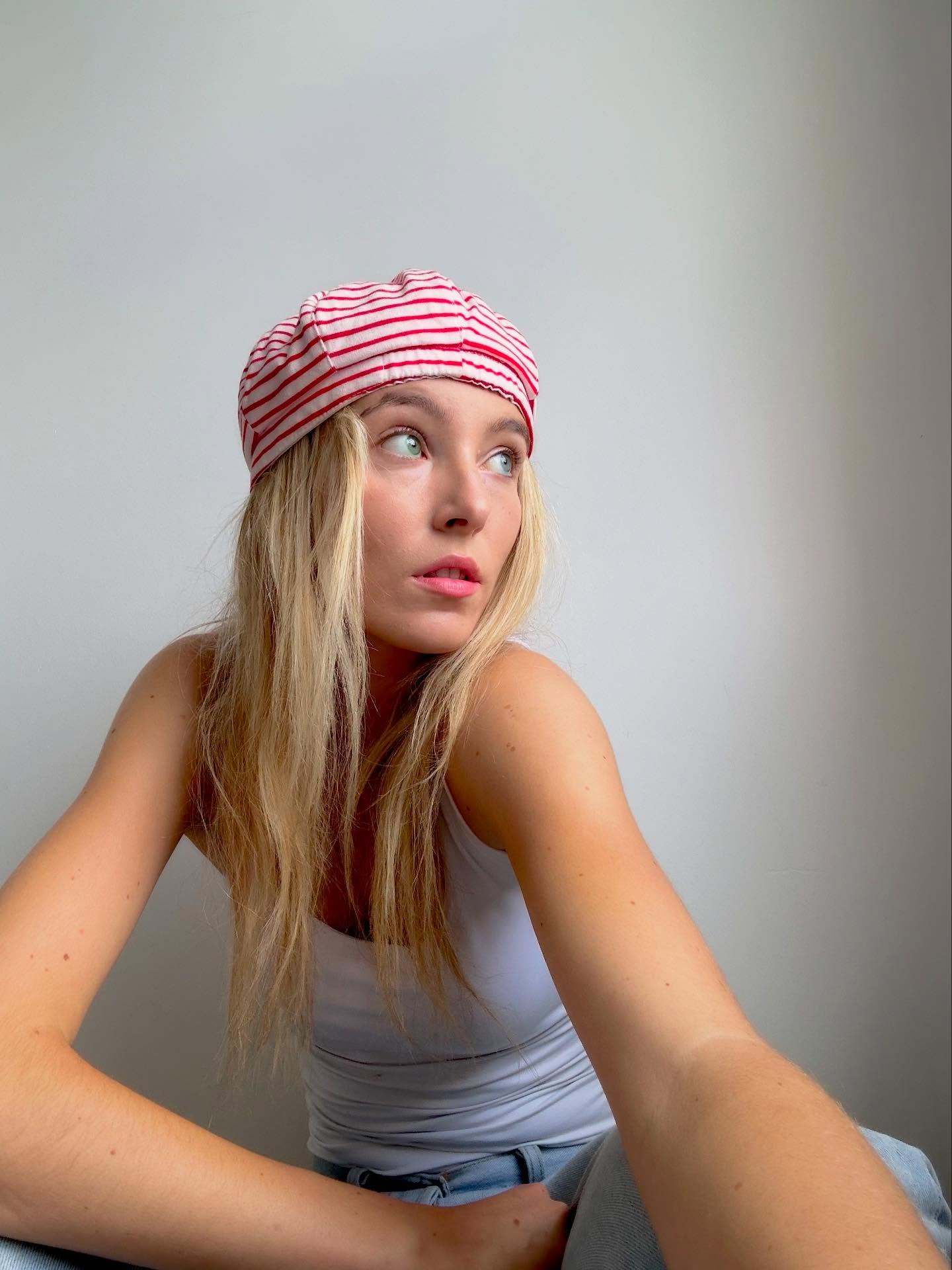 Light Blonde Long Textured Waves with Casual Hat