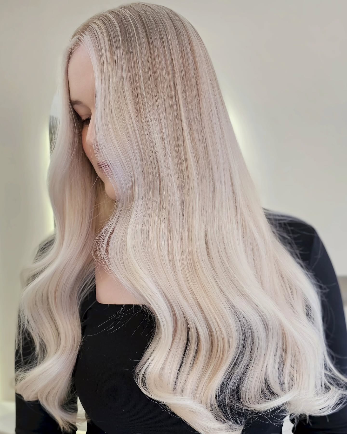 Platinum Blonde Locks with Subtle Face-Framing Highlights