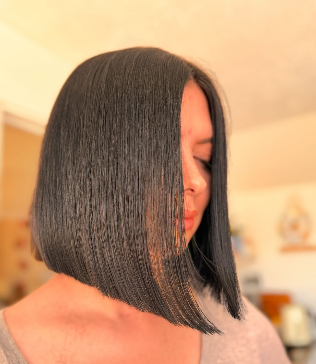 Sleek Jet-Black Asymmetrical Bob