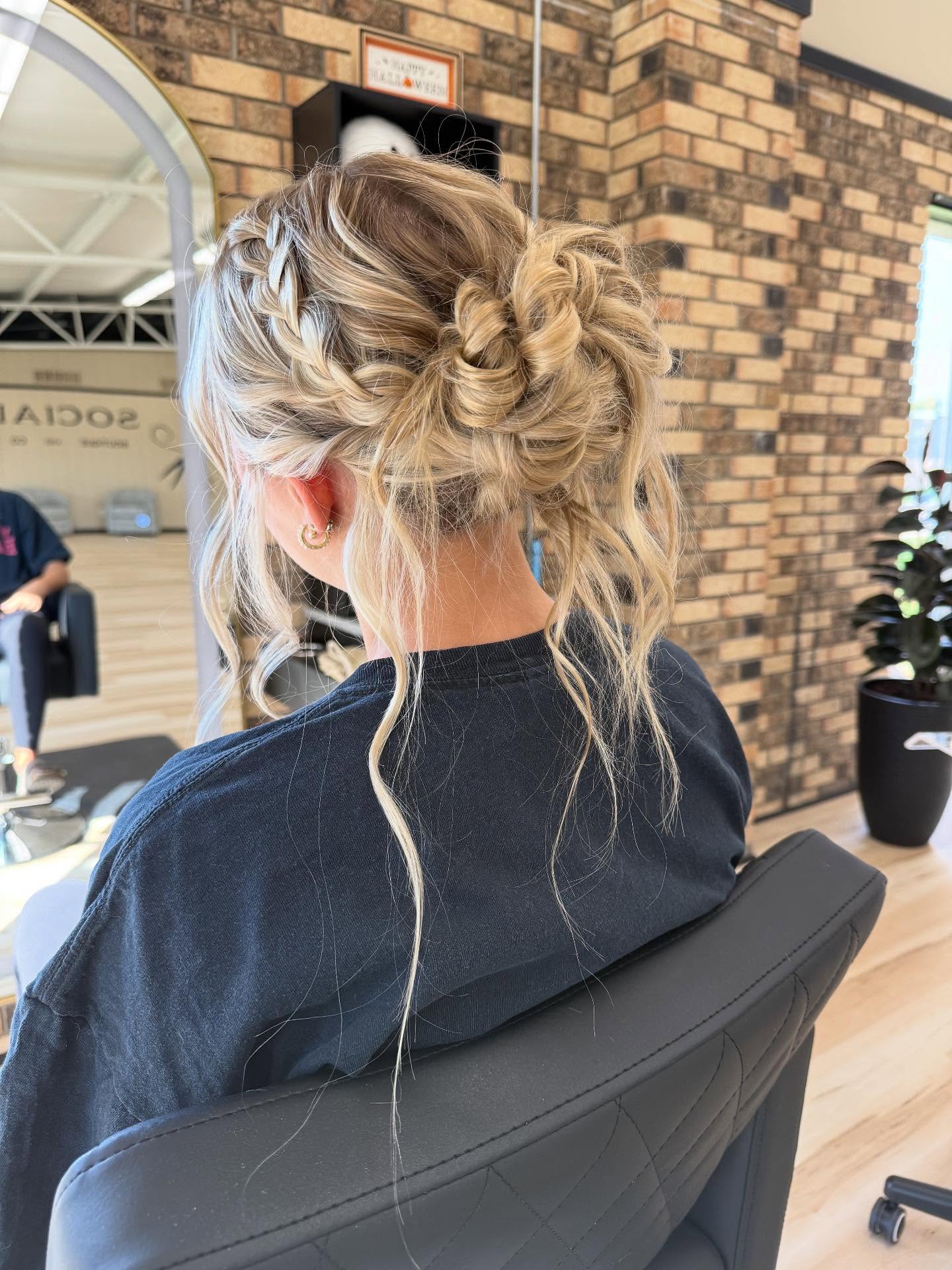 Twisted Blonde Updo with Delicate Strands