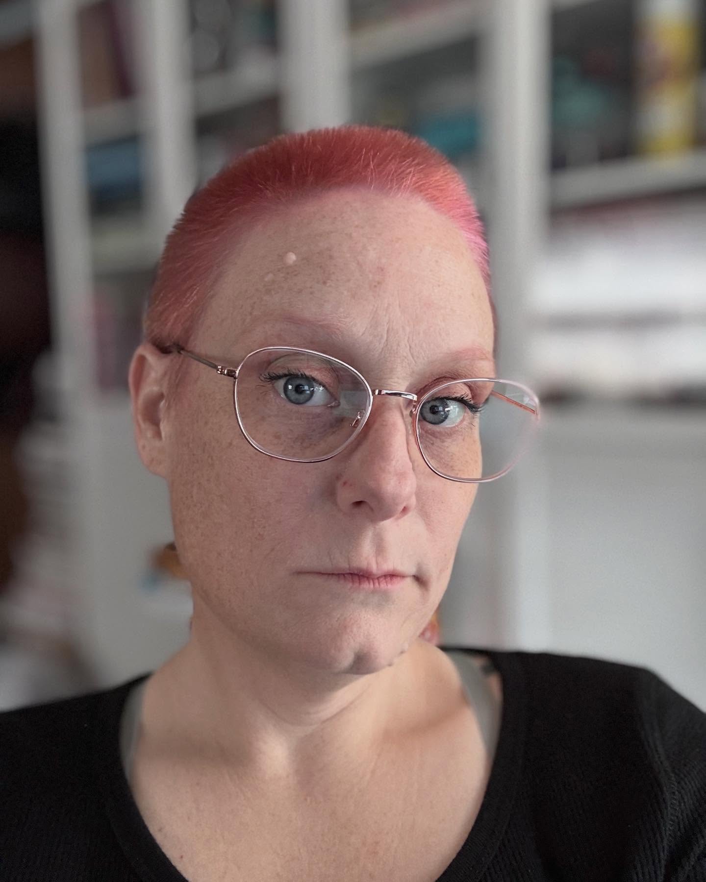 Vibrant Pink Buzz Cut with Defined Edges