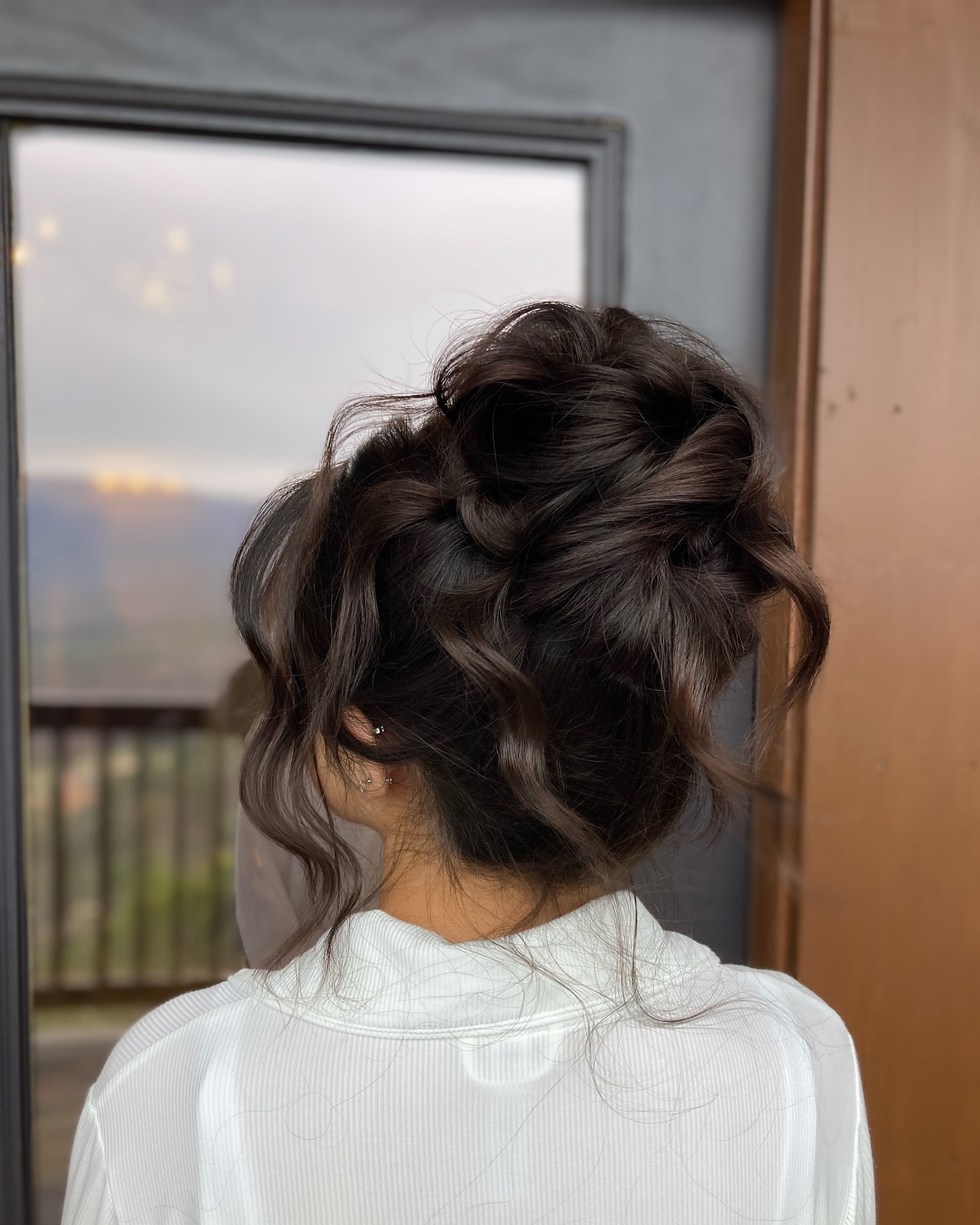 Whimsical Loose Tendril Updo