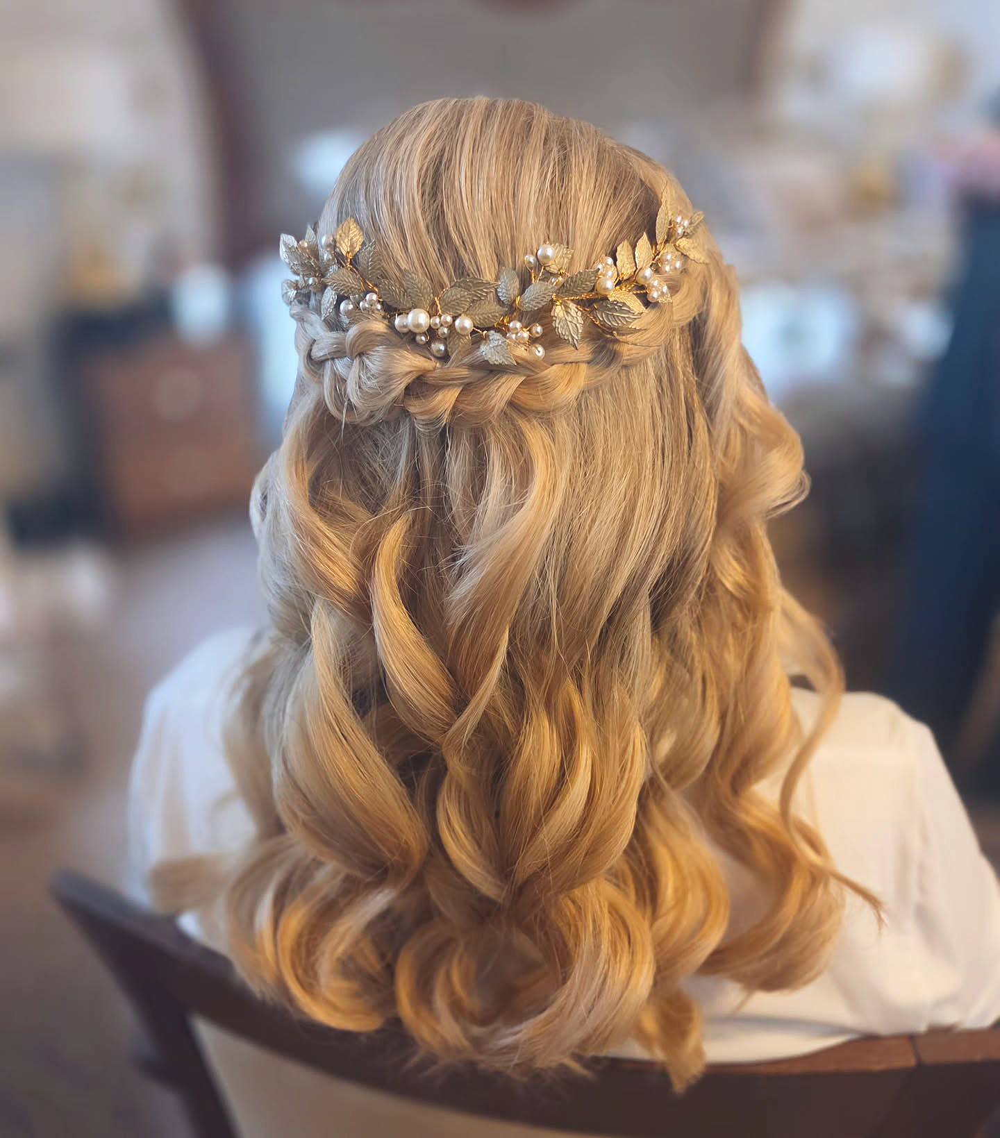Elegant Half Up Half Down Romantic Waves with Floral Accents