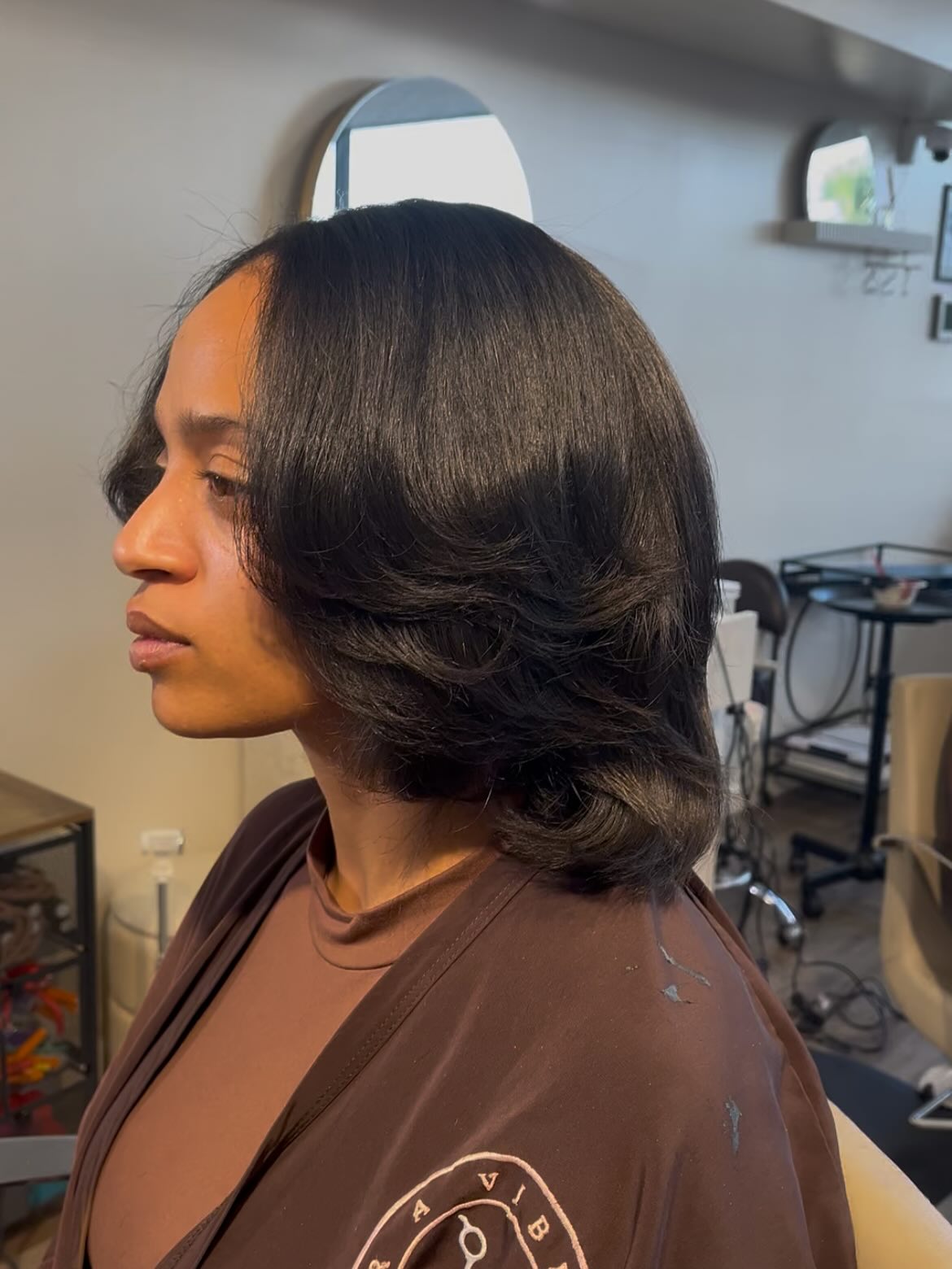 Elegant Sable Layered Cut with Soft Curls