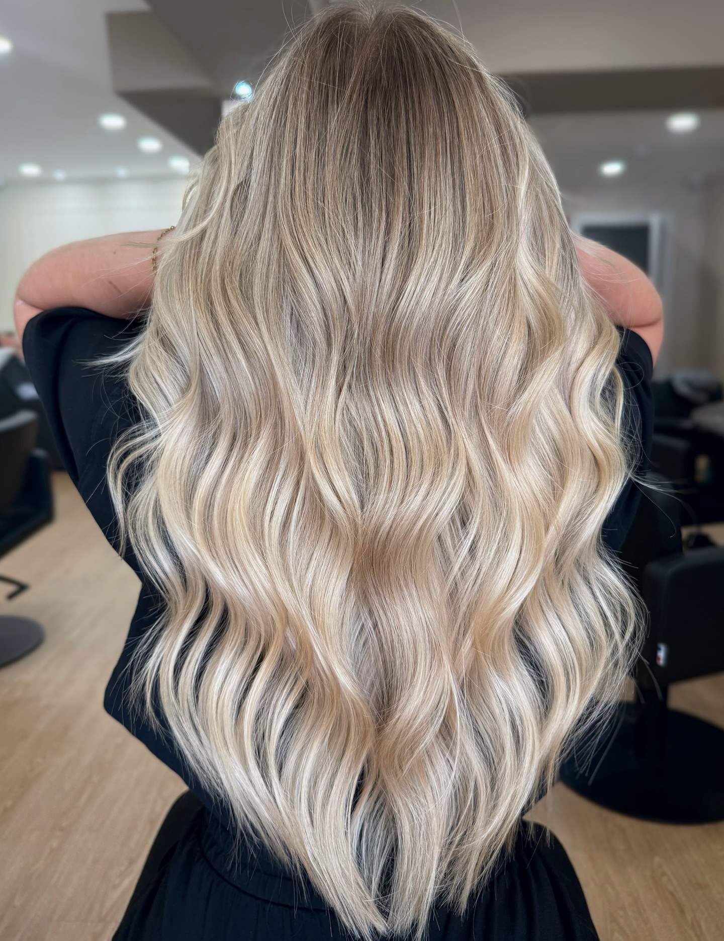Long, Luscious Waves with Sunlit Blonde Highlights
